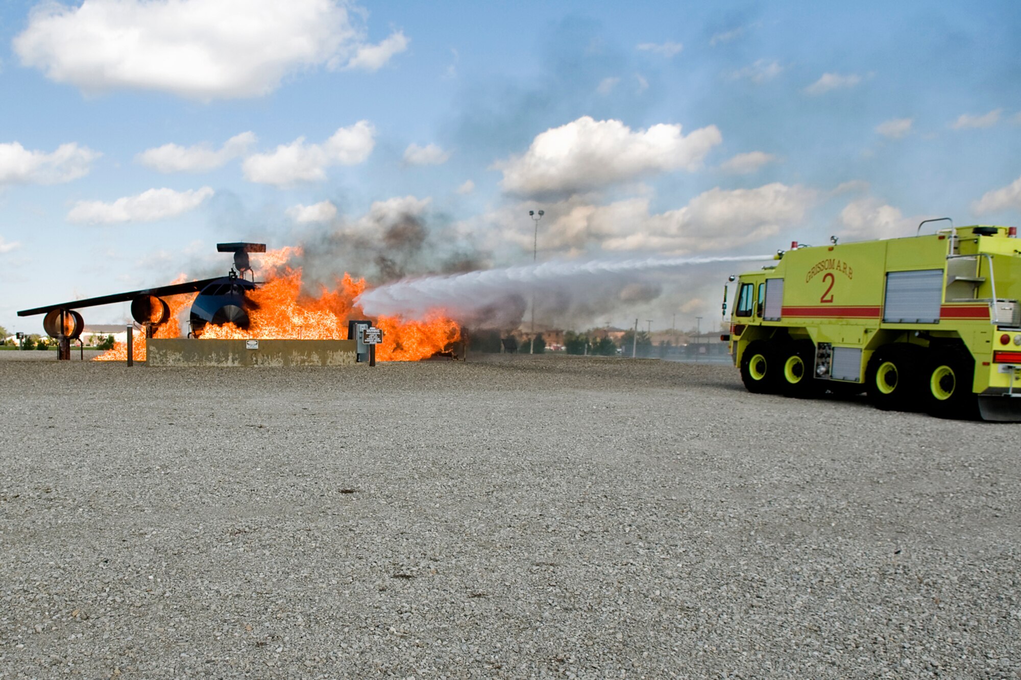 GRISSOM AIR RESERVE BASE, Ind. -- Grissom's honorary commanders put out a simulated aircraft fire here Oct. 14. The honorary commanders visited the base to learn more about the 434th Mission Support Group. The honorary commander program at Grissom is just one of several community outreach programs aimed at educating the public about Grissom's mission and impact on the community.  (U.S. Air Force photo/Senior Airman Jami K. Lancette)    
