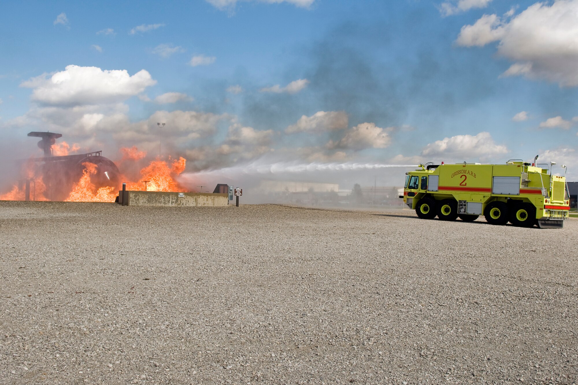 GRISSOM AIR RESERVE BASE, Ind. -- Grissom's honorary commanders put out a simulated aircraft fire here Oct. 14. The honorary commanders visited the base to learn more about the 434th Mission Support Group. The honorary commander program at Grissom is just one of several community outreach programs aimed at educating the public about Grissom's mission and impact on the community.  (U.S. Air Force photo/Senior Airman Jami K. Lancette)    