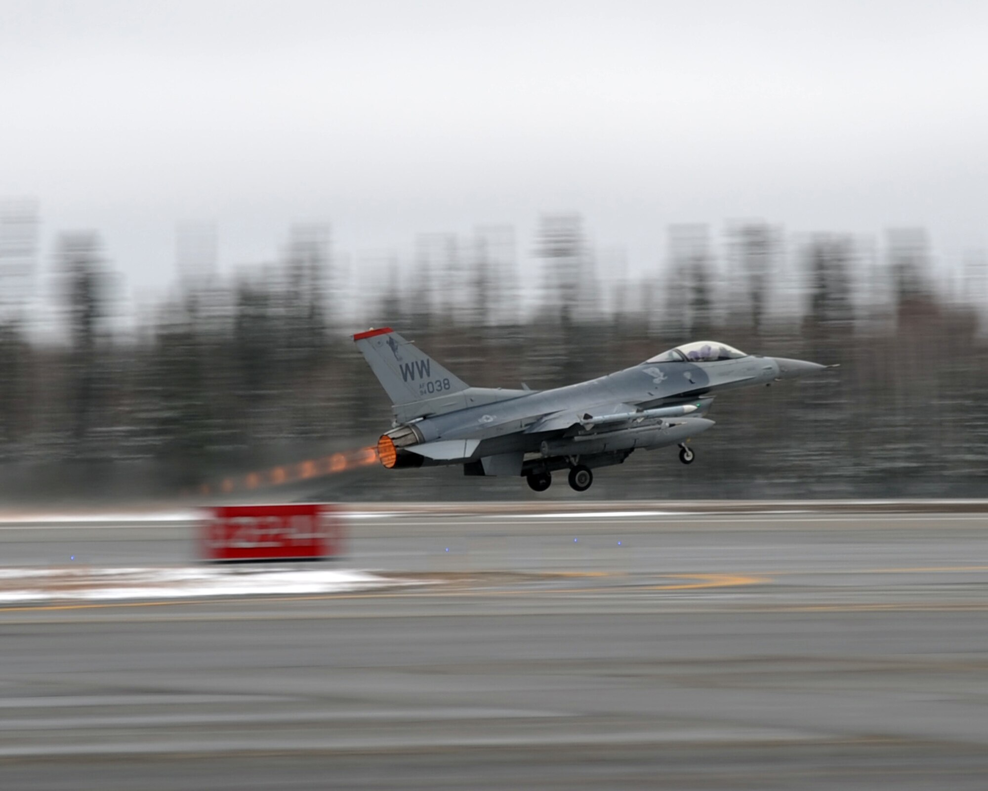 A U.S. Air Force F-16 Fighting Falcon assigned to Misawa Air Base, Japan, takes off from Eielson Air Force Base, Alaska, Oct. 18, 2011. The F-16 is participating in RED FLAG-Alaska 12-1, a two-week exercise that provides training for deployed maintenance and support personnel. (U.S. Air Force photo by Senior Airman Willard E. Grande II)