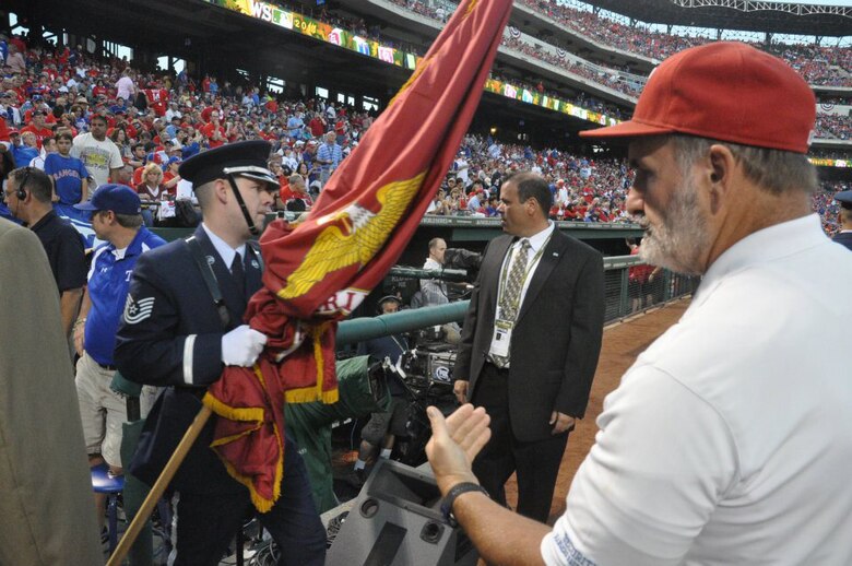 The Sheppard Air Force Base Honor Guard presented the colors at game four of the World Series Oct. 23, 2011, at the Rangers Ballpark in Arlington, Texas, for a crowd of 50,000. (U.S. Air Force courtesy photo/Ben Coker)