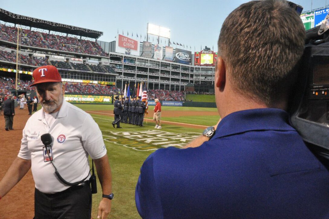 The Sheppard Air Force Base Honor Guard presented the colors at game four of the World Series Oct. 23, 2011, at the Rangers Ballpark in Arlington, Texas, for a crowd of 50,000. (U.S. Air Force courtesy photo/Ben Coker)