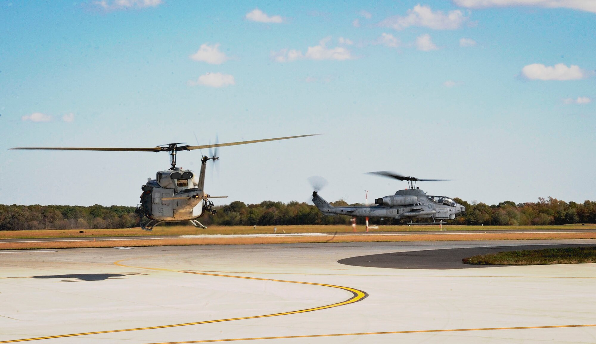 Pilots with the Light Attack Helicopter Squadron 773 fly UH-1N Iroquois helicopters and AH-1W Super Cobra helicopters to provide support during a Joint Tactical Recovery of Aircraft and Personnel exercise held Oct. 15 here. The Iroquois crew chiefs provided machine-gun fire, while the Super Cobra helicopter pilots used rockets to hold back enemy forces. The Joint TRAP exercise tested the Reservists’ ability to recover downed aircrew members behind enemy lines. (U.S. Air Force photo by Airman 1st Class Dennis L. Sloan/Released)
