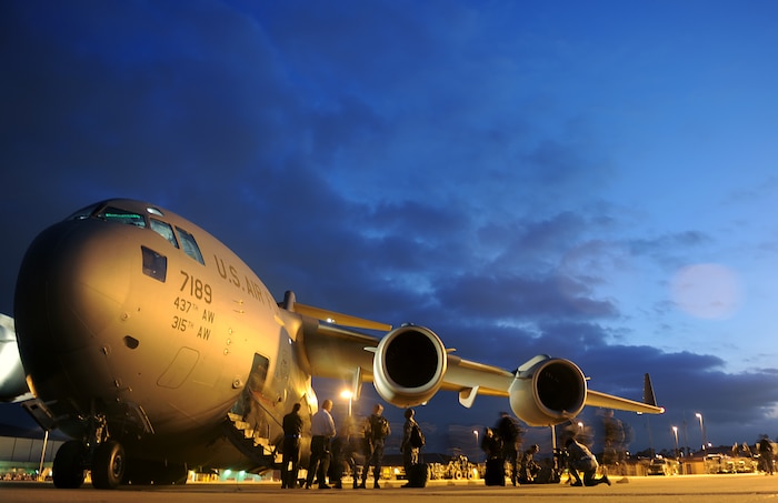 Joint Base Charleston Airmen exit a C-17 at Gulfport, Miss. during an Operational Readiness Exercise  Oct. 24. The ORE is in preparation for the command's upcoming Operational Readiness Inspection which evaluates Airmen's mission readiness in preparation for real world deployments.(U.S. Air Force photo/Staff Sgt. Chad Trujillo)