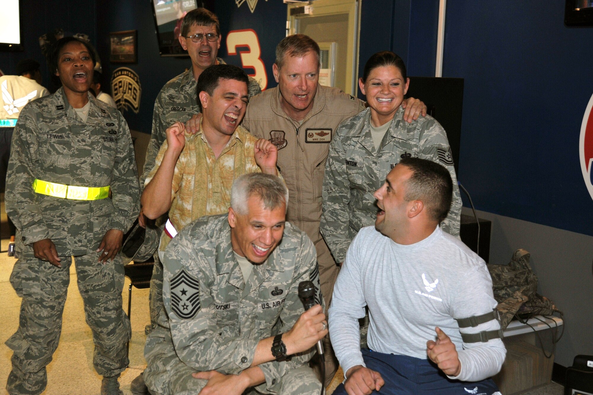 Members of the 386th Air Expeditionary Wing participate in kraoke as part of the Authentic Arabic Food Sampling and Karaoke event Oct. 25 at an undisclosed location in Southwest Asia. (U.S. Air Force photo by Master Sgt. Carlotta Holley)
