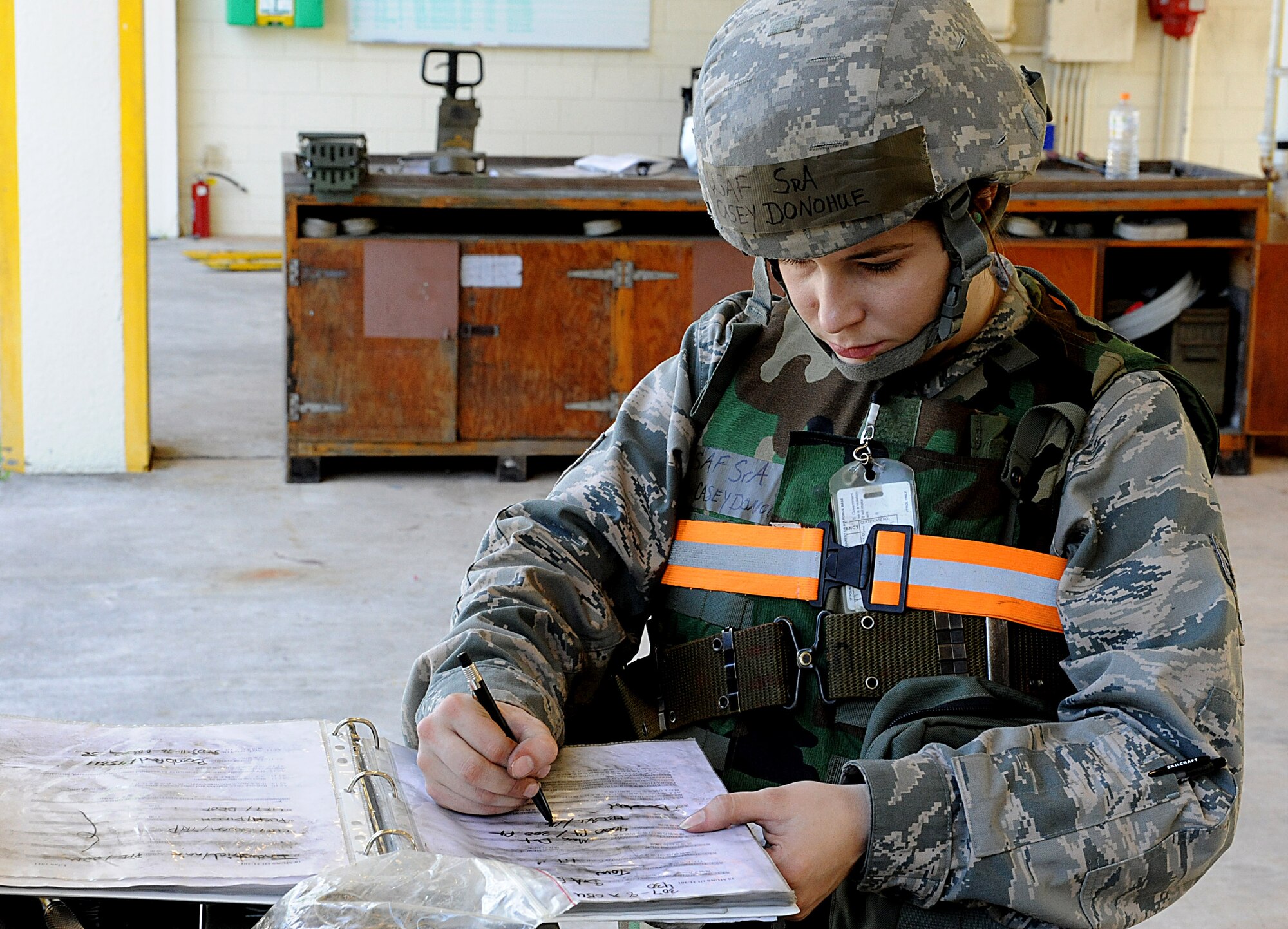 U.S. Air Force Senior Airman Casey Donohue, 18th Maintenance Group, line driver, finishes an inventory checklist during local operational readiness exercise Beverly High 12-1, on Kadena Air Base, Japan, Oct. 26. Beverly High is designed to test the combat readiness of servicemembers assigned to Kadena Air Base. (U.S. Air Force photo/Airman 1st Class Justin Veazie/released)