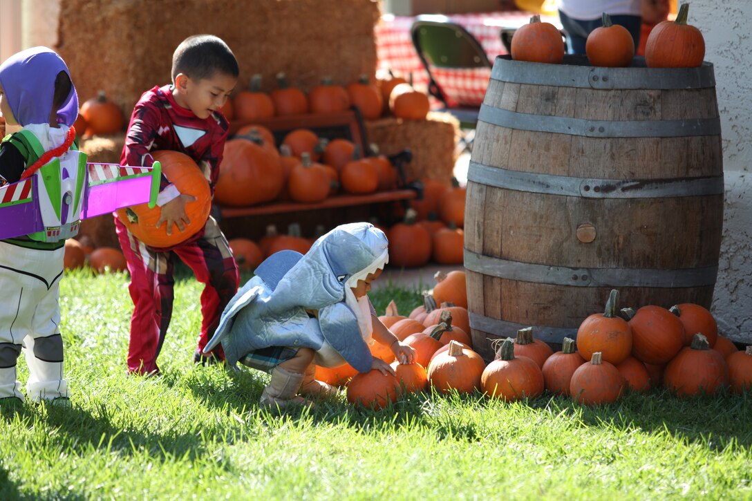 Hundreds gathered at Camp Pendleton’s Stuart Mesa Community Center to embrace the fall season during the annual Harvest Festival, Oct. 26. The event, sponsored by Marine Corps Community Services, offers a fun and safe alternative for Marines and their families to celebrate the holidays without ghosts, goblins and vampires.::r::::n::