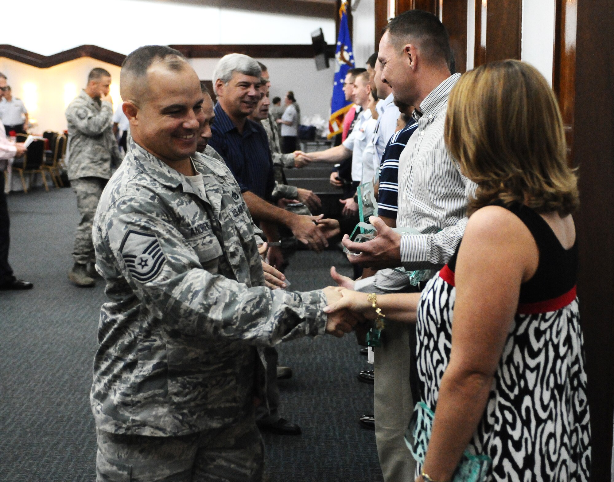ANDERSEN AIR FORCE BASE, Guam—The 36th Wing quarterly award winners are congratulated during the award recognition breakfast at the Sunrise Conference Center here, Oct. 27. Each group was represented by their quarterly award winning Airmen, NCO, SNCO and civilian during the ceremony. (U.S. Air Force photo by Senior Airman Benjamin Wiseman/Released)