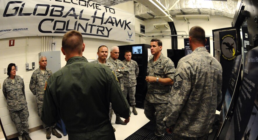 ANDERSEN AIR FORCE BASE, Guam—Col. Kevin Cavanagh, 940th Wing commander, Beale Air Force Base, Calif., visits the 9th Operations Group detachment 3 during a visit to the base here, Oct. 26. Colonel Cavanagh came to visit members of his wing deployed here at Andersen and to see their daily operations. (U.S. Air Force photo by Senior Airman Benjamin Wiseman/Released)