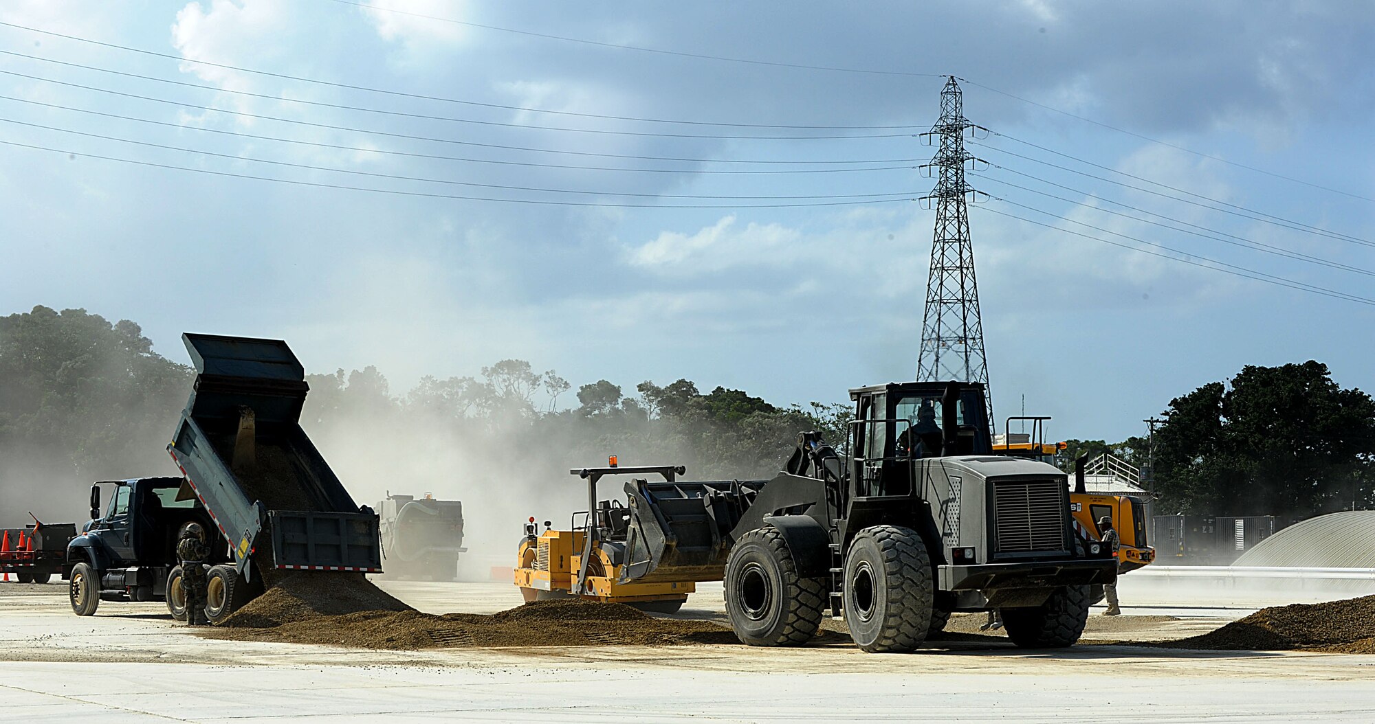 Pavement and equipment Airmen from the 18th Civil Engineer Squadron train on airfield repair on Kadena Air Base, Japan, Oct. 27. To stay qualified the Airmen are required to train every three years, but local operational readiness exercises allow Airmen to train once a quarter. (U.S. Air Force photo/Airman 1st Class Brooke P. Beers/Released)