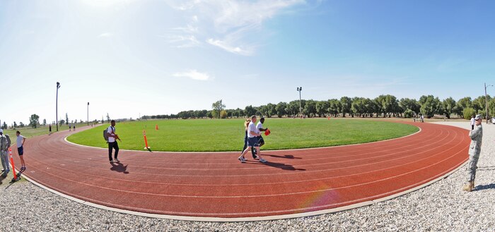 Participants for the Combined Federal Campaign Walk-a-Thon, walk, jog, or run around the track for a thirty minute time frame during the 12 fundraiser campaign. Military members and civilians participated in the CFC fundraiser, which is the world's largest and most successful annual workplace charity campaign, with more than 200 CFC campaigns throughout the country and internationally to help to raise millions of dollars each year.  (U.S. Air Force photo by SrA Samantha Krolikowski)