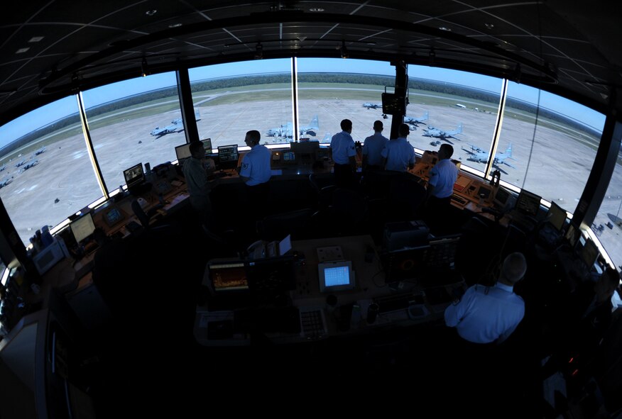 FIVE THINGS IN THE HERC THAT WILL KILL YOU - Air traffic controllers from the 19th Operations Support Squadron, manage aircraft in the tower cab, Sept. 26, 2011, on Little Rock Air Force Base, Ark. The Little Rock flight tower manages air space for 95 assigned C-130ís and other Air Mobility Command traffic. (U.S. Air Force photo by Senior Airman Caleb Pierce)