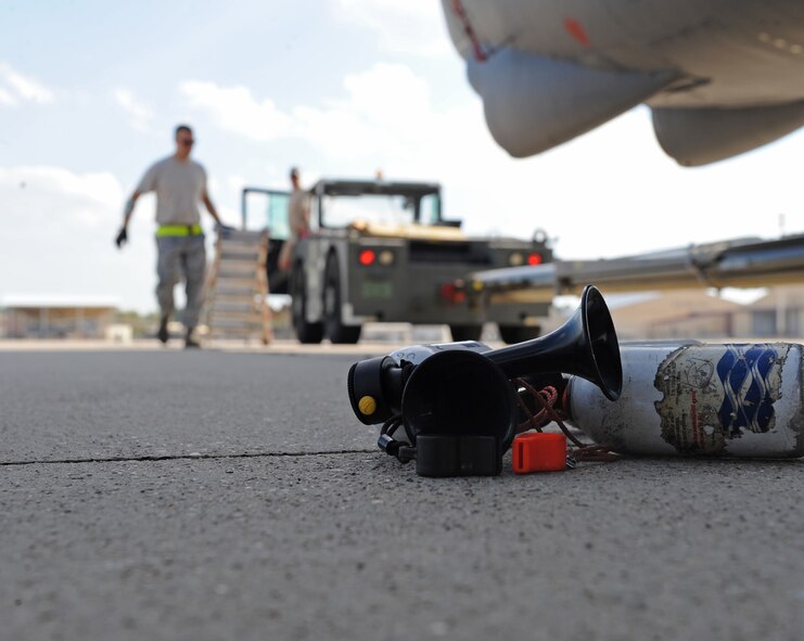 Tech. Sgt. Christian Davis, 2nd Aircraft Maintenance Squadron, prepares to disconnect a B-52H Stratofortress from a tow truck on Barksdale Air Force Base, La., Oct. 25. The B-52H was moved out to the flight-line for scheduled maintenance. (U.S. Air Force photo/Airman 1st Class Micaiah Anthony)(RELEASED)