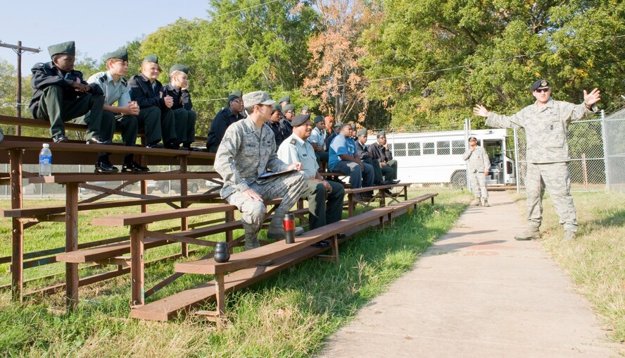 Staff Sgt. Clayton Tebbetts, 2nd Security Forces Squadron, briefs Junior Reserve Officer Training Corps cadets on military working dogs and how they differ from regular police dogs on Barksdale Air Force Base, La., Oct. 26. JROTC cadets from Mansfield High School came to Barksdale AFB to receive a tour of the base which included a military working dog demonstration. (U.S. Air Force photo/Airman 1st Class Benjamin Gonsier)(RELEASED)
