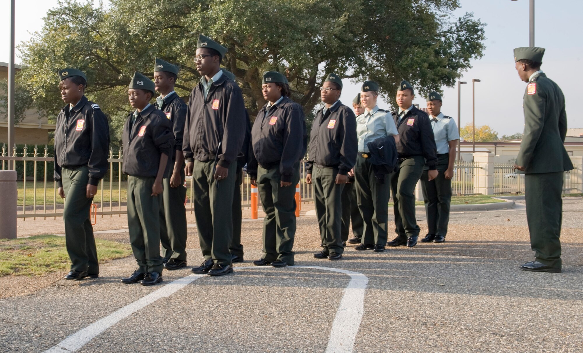Junior Reserve Officer Training Corps cadets from Mansfield High School stand at attention on Barksdale Air Force Base, La., Oct. 26. The cadets visited Barksdale to tour base facilities, see aircraft static displays and visit with Airmen. (U.S. Air Force photo/Airman 1st Class Benjamin Gonsier)(RELEASED)