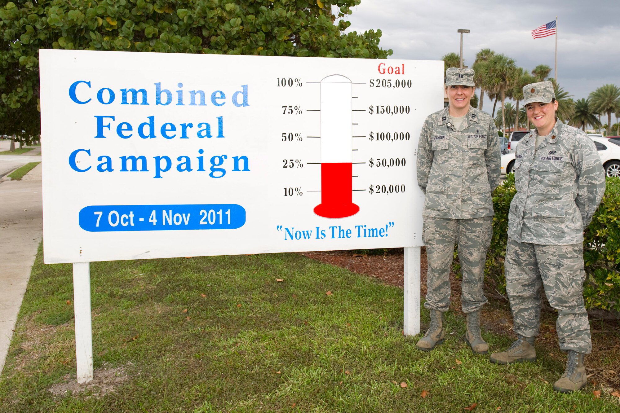 PATRICK AIR FORCE BASE, Fla. -- Combined Federal Campaign 45th Space Wing Project Officers Maj. Shana Figueroa and Capt. Jennifer Spencer updated Wednesday signs showing Week 2 donations, which shot up to 25 percent of the campaign's total goal of $205,000. CFC continues through Nov. 4, so there are less than two weeks remaining to reach that goal. "Being a Wingman is about helping people in their time of need," said Major Figueroa. "Be a good Wingman and donate to CFC. Every penny counts!" (U.S. Air Force photo/Matthew Jurgens)

