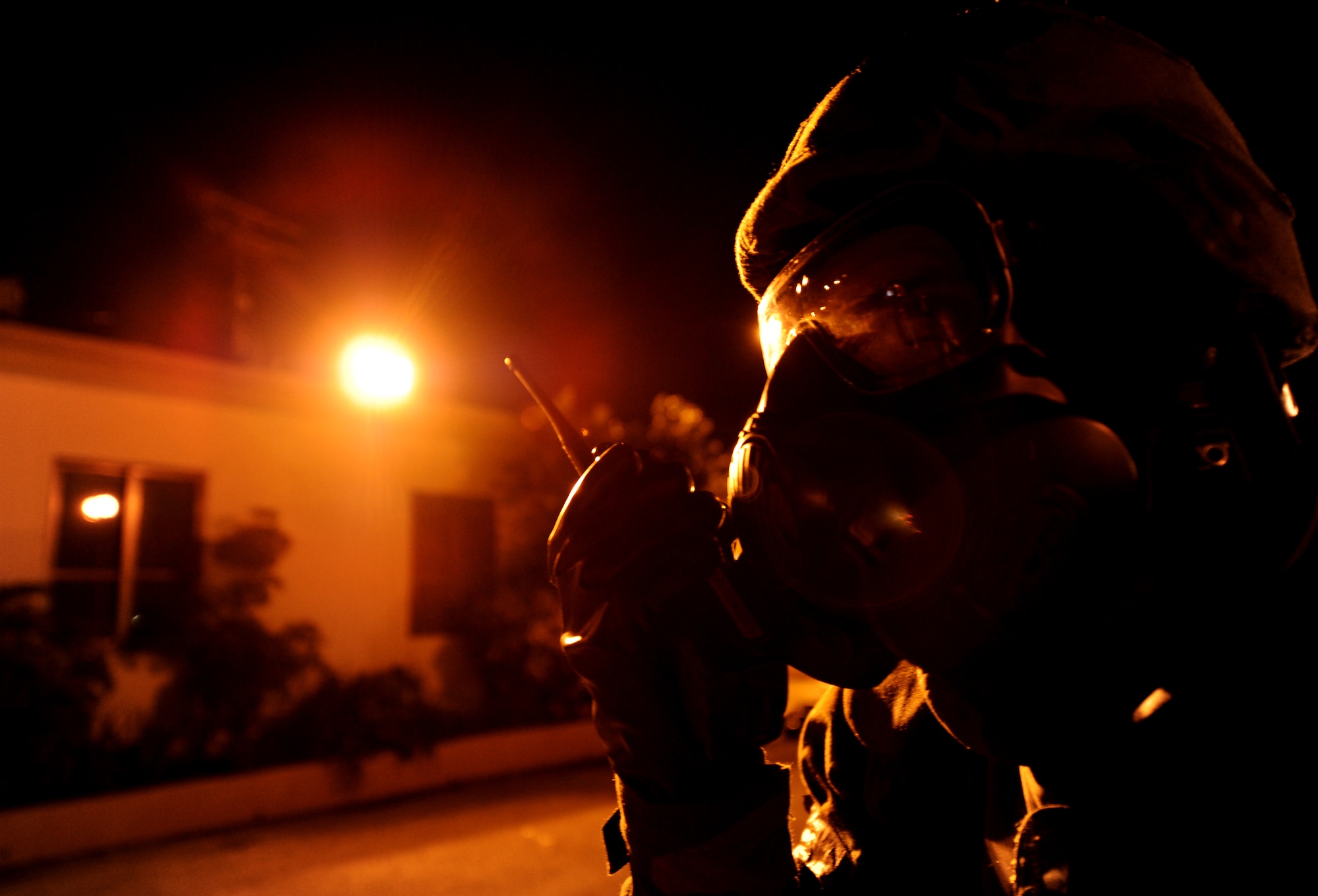 U.S. Air Force Senior Airman Logan Jenkins, 18th Logistics Readiness Squadron vehicle operator informs his leadership about a mock unexplained ordinance found while conducting a post attack reconnaissance sweep during Beverly High 12-1, a local operational readiness exercise, on Kadena Air Base, Japan, Oct. 27. During the week-long phase one and two exercise, Airmen across the base train in a variety of training scenarios to include self-aid and buddy care and chemical attacks. (U.S. Air Force photo/Airman 1st Class Jarvie Z. Wallace/released)  
