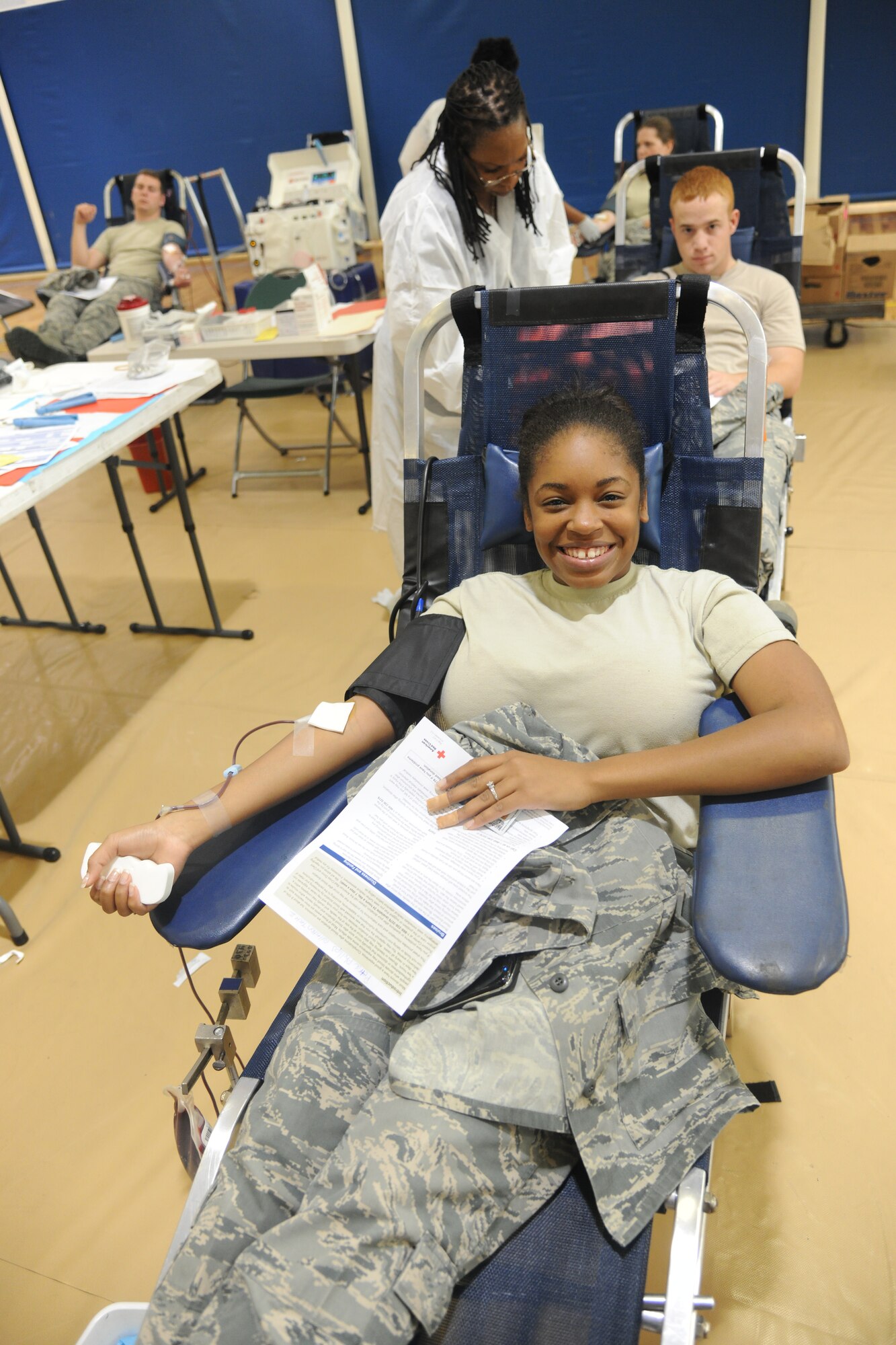 U.S. Air Force Airman 1st Class Iyannika Johnson, 23rd Aerospace Medicine Squadron public health technician, gets her blood drawn at Moody Air Force Base, Ga., Oct. 26, 2011. Johnson said it was her first time giving blood but wouldn’t be her last. She also said she gave blood because she wants to help save lives. She has an O positive blood type, which is in high demand. (U.S. Air Force photo by Airman 1st Class Paul Francis/Released)

