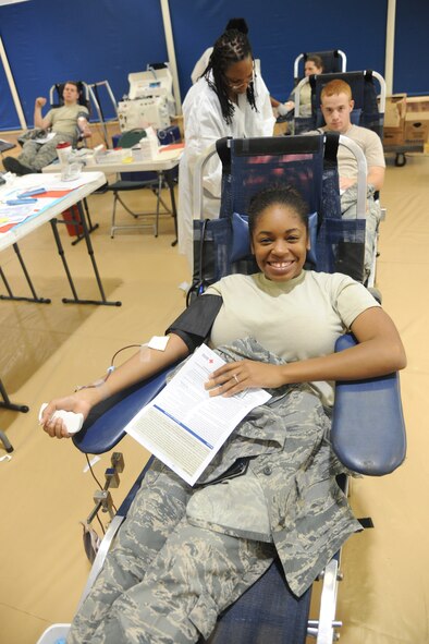 U.S. Air Force Airman 1st Class Iyannika Johnson, 23rd Aerospace Medicine Squadron public health technician, gets her blood drawn at Moody Air Force Base, Ga., Oct. 26, 2011. Johnson said it was her first time giving blood but wouldn’t be her last. She also said she gave blood because she wants to help save lives. She has an O positive blood type, which is in high demand. (U.S. Air Force photo by Airman 1st Class Paul Francis/Released)
