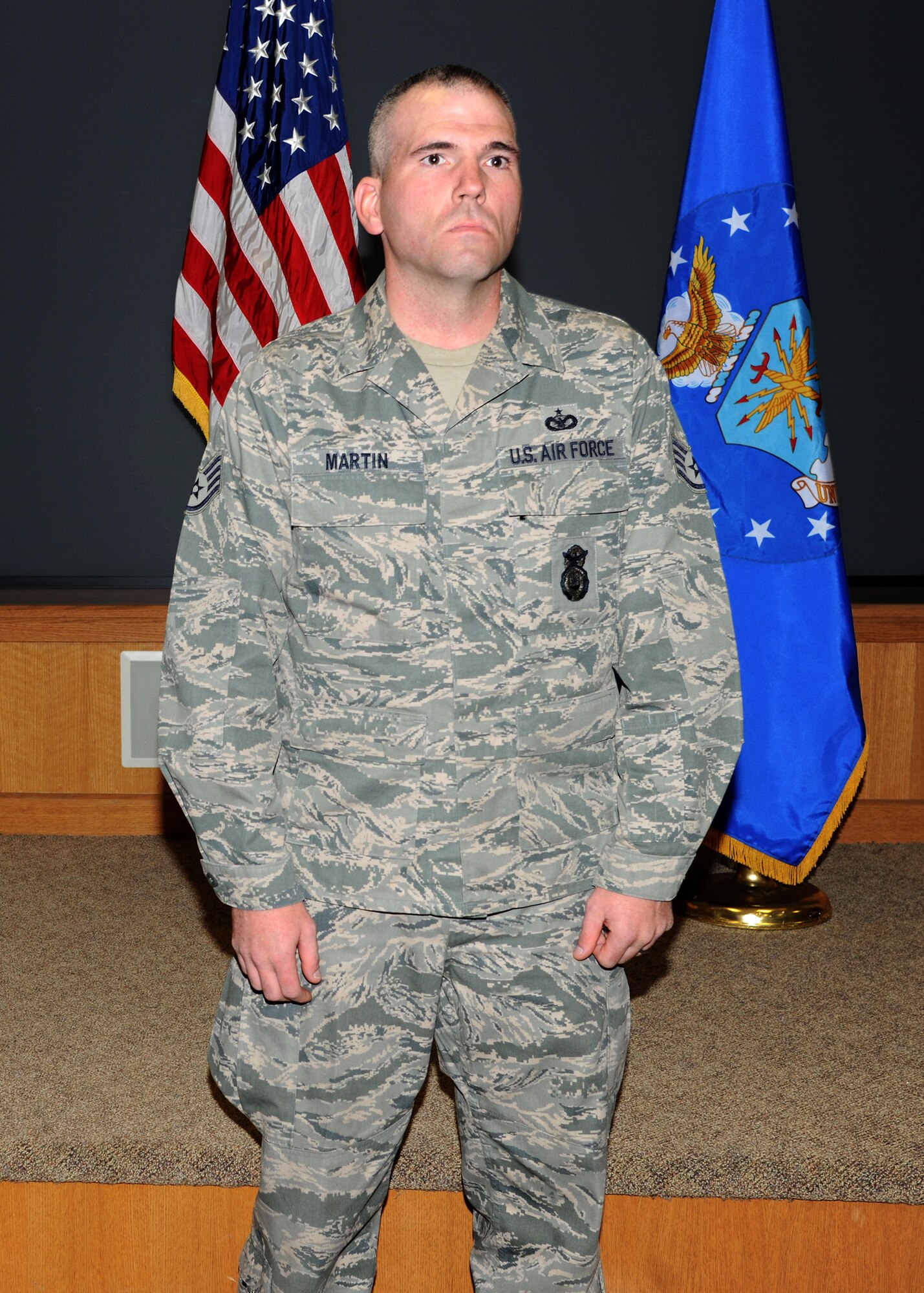 U.S. Air Force Staff Sgt. Bryant Martin, 319th Security Forces Squadron, gives a speech on Oct. 26 at Grand Forks Air Force Base, N.D. Bryant is credited with helping a 5-year-old base family member who stopped breathing during a seizure on base Oct. 23. (U.S. Air Force photo/Airman 1st Class Ashley Taylor)