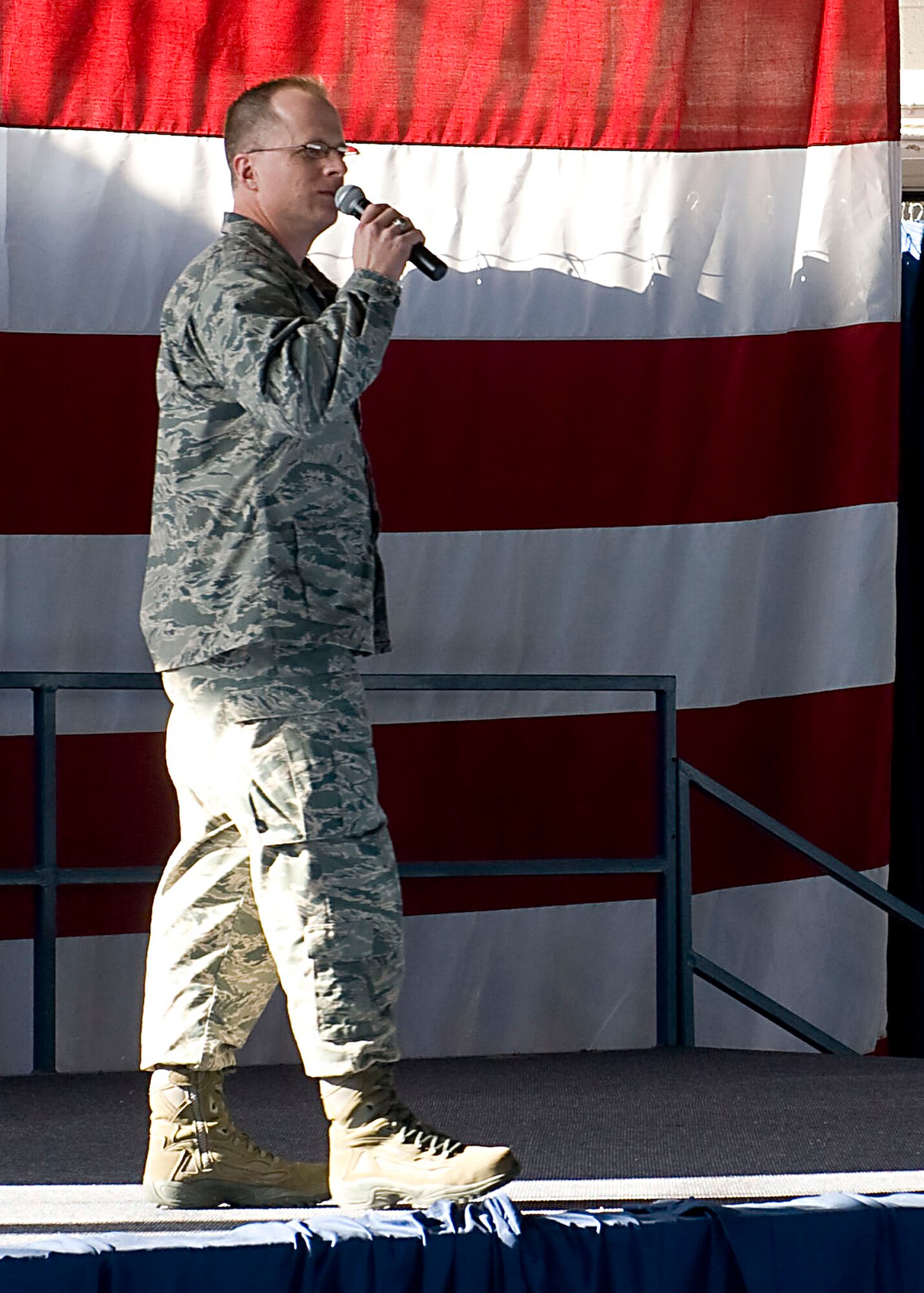 Col. Mark Weatherington, 28th Bomb Wing commander, addresses his Airmen during a commander’s call on Ellsworth Air Force Base, S.D. Oct. 26, 2011. He discussed for topics facing the wing; winter weather, DUIs, preparation for the operational readiness inspection and the upcoming goal day. (U.S. Air Force photo by Airman 1st Class Katherine Thornton/Released)