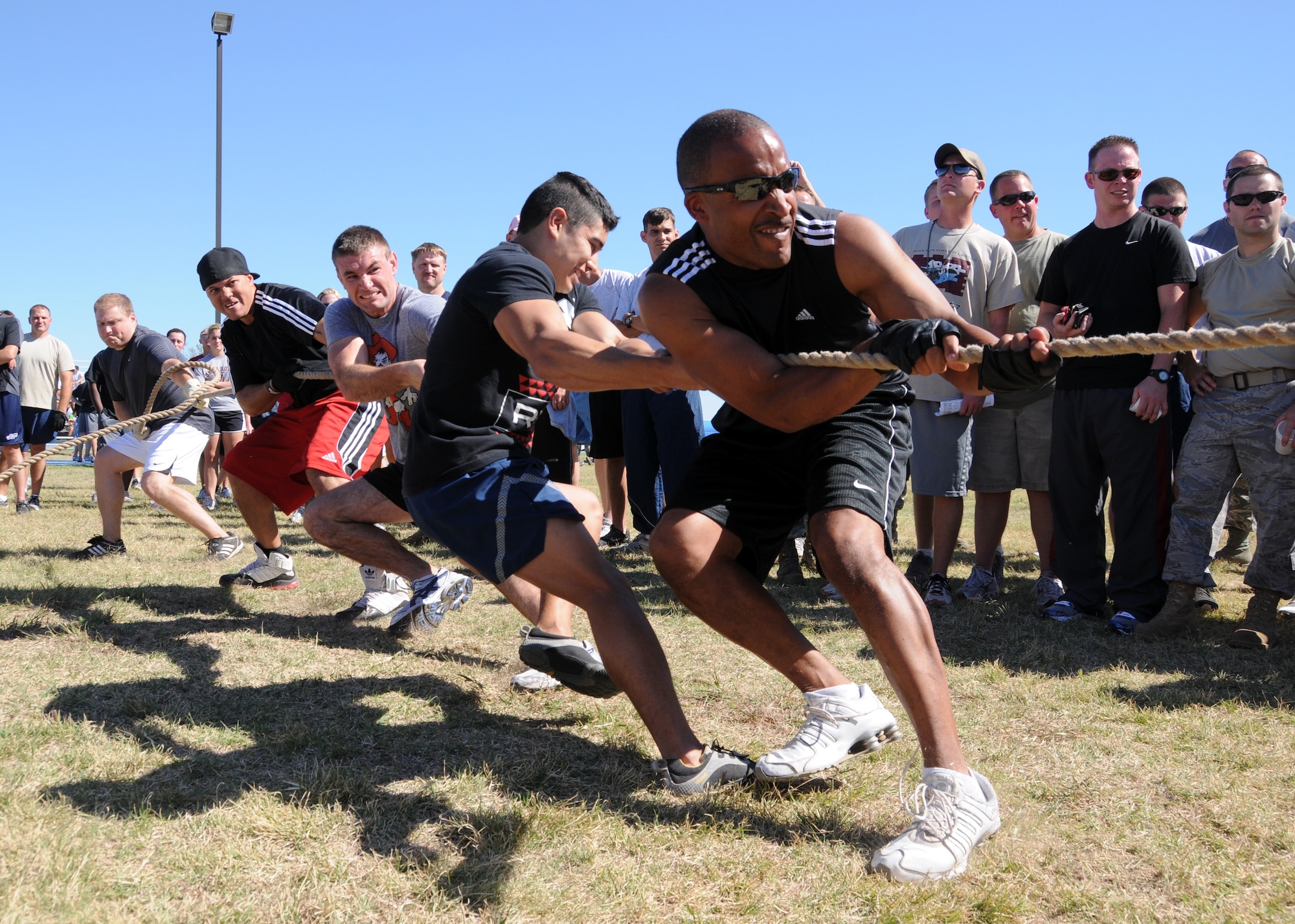 Airmen assigned to the 137th Air Refueling Wing show their strength during a match of tug-of-war held on base, Oct 1. At the end of the day, the 137th ARW came in second place overall. 
(U.S. Air Force Photo by Staff Sgt Caroline Hayworth/Released)