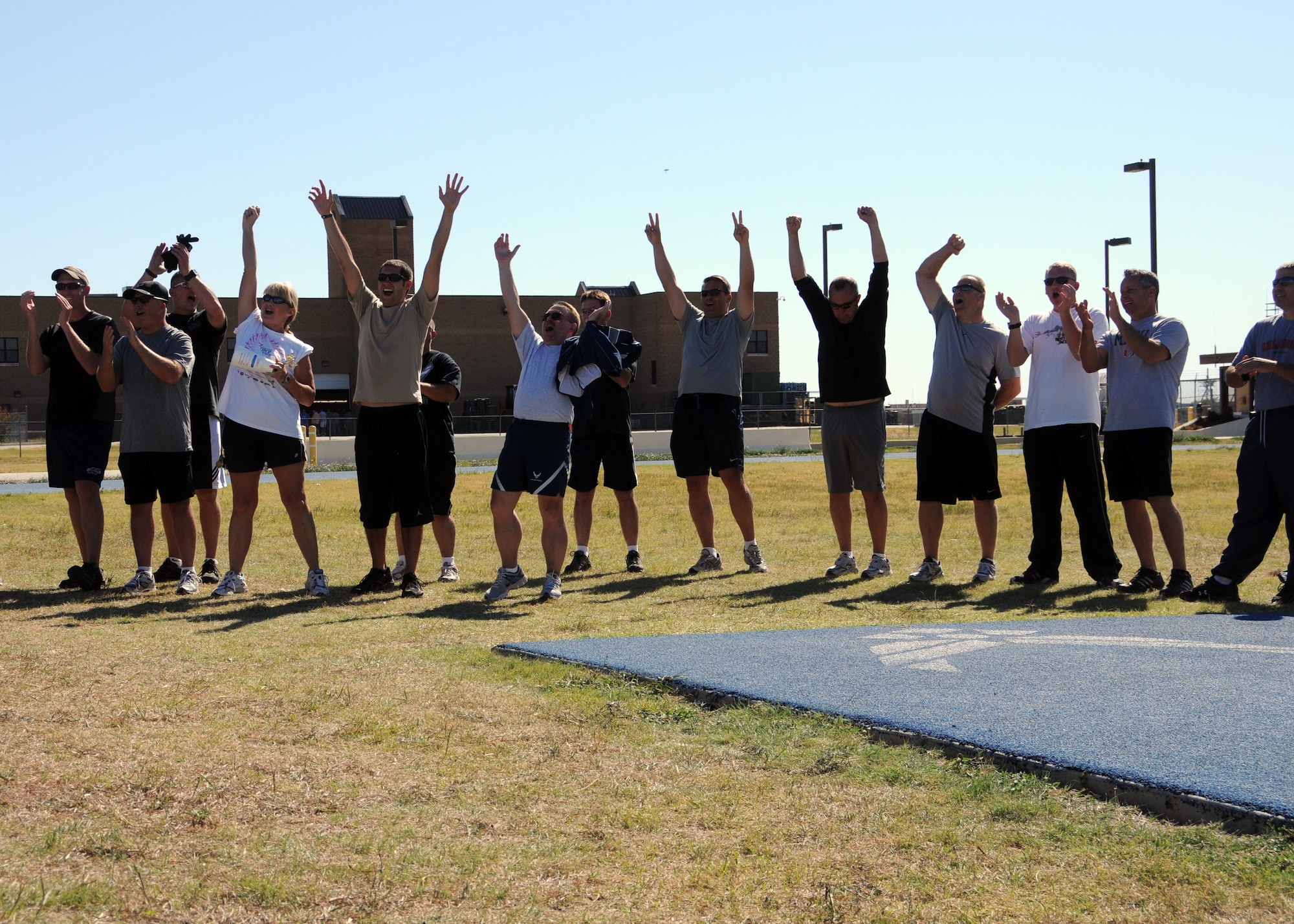 Airmen assigned to the 137th Maintenance Group here  celebrate victory as they were announced as the first-place winners during the base Olympics held on base, Oct 1. Coming in a close second was the 137th Air Refueling Wing, and following in third was the 137th Medical Group.
(U.S. Air Force Photo by Staff Sgt Caroline Hayworth/Released)