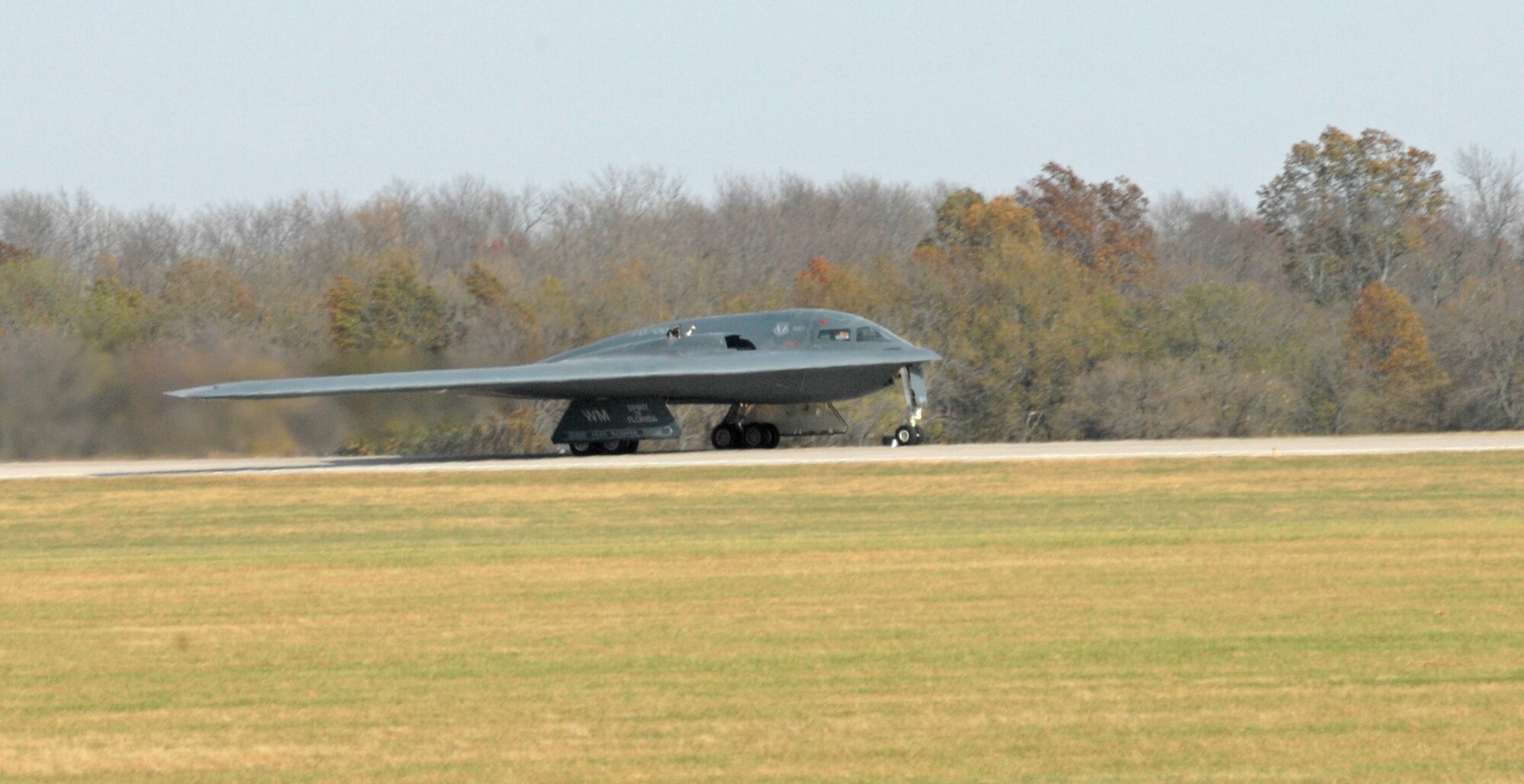 A B-2 Spirit roars down the runway during the rapid launch portion of Global Thunder 12 here Oct. 25. The exercises are designed to exercise all mission areas with primary emphasis on Command and Control. The exercise provides training opportunities for component, task force, unit, forces, and command posts to deter, and if necessary defeat, a military attack against the United States and to employ forces as directed by the president. (U.S. Air Force photo/Staff Sgt. Alexandra M. Boutte) (RELEASED)