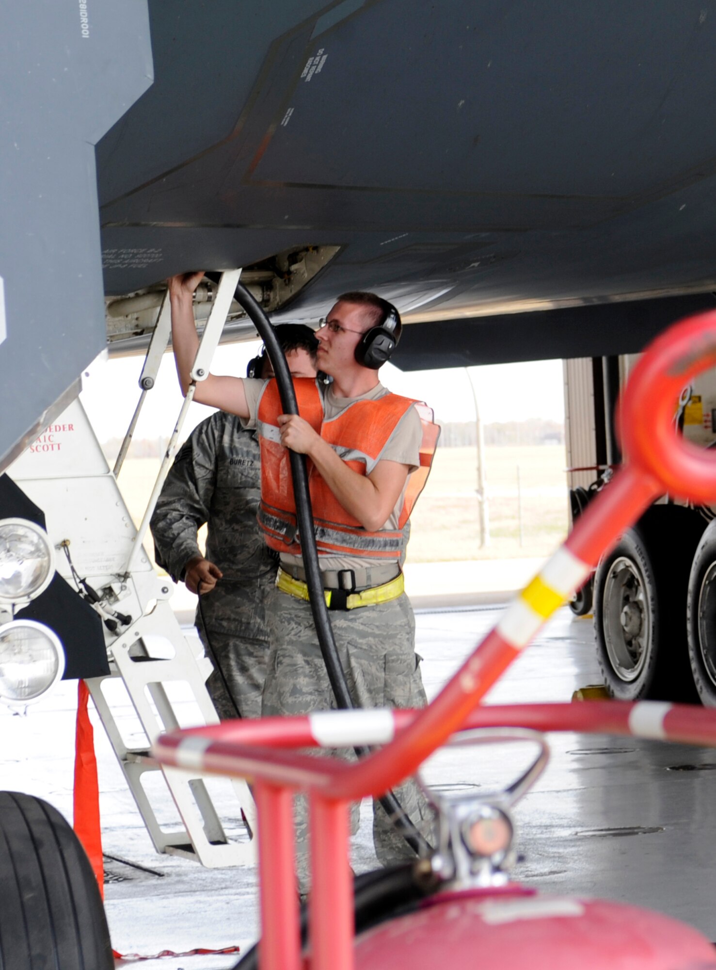 Members of 509th Aircraft Maintenance Squadron prepare the B-2 Spirit for flight during a Global Thunder 12 here Oct. 25. The exercise included a wide range of forces working together incorporating the latest technology and techniques in support of each other to complete the mission. (U.S. Air Force photo/Staff Sgt. Alexandra M. Boutte) (RELEASED)