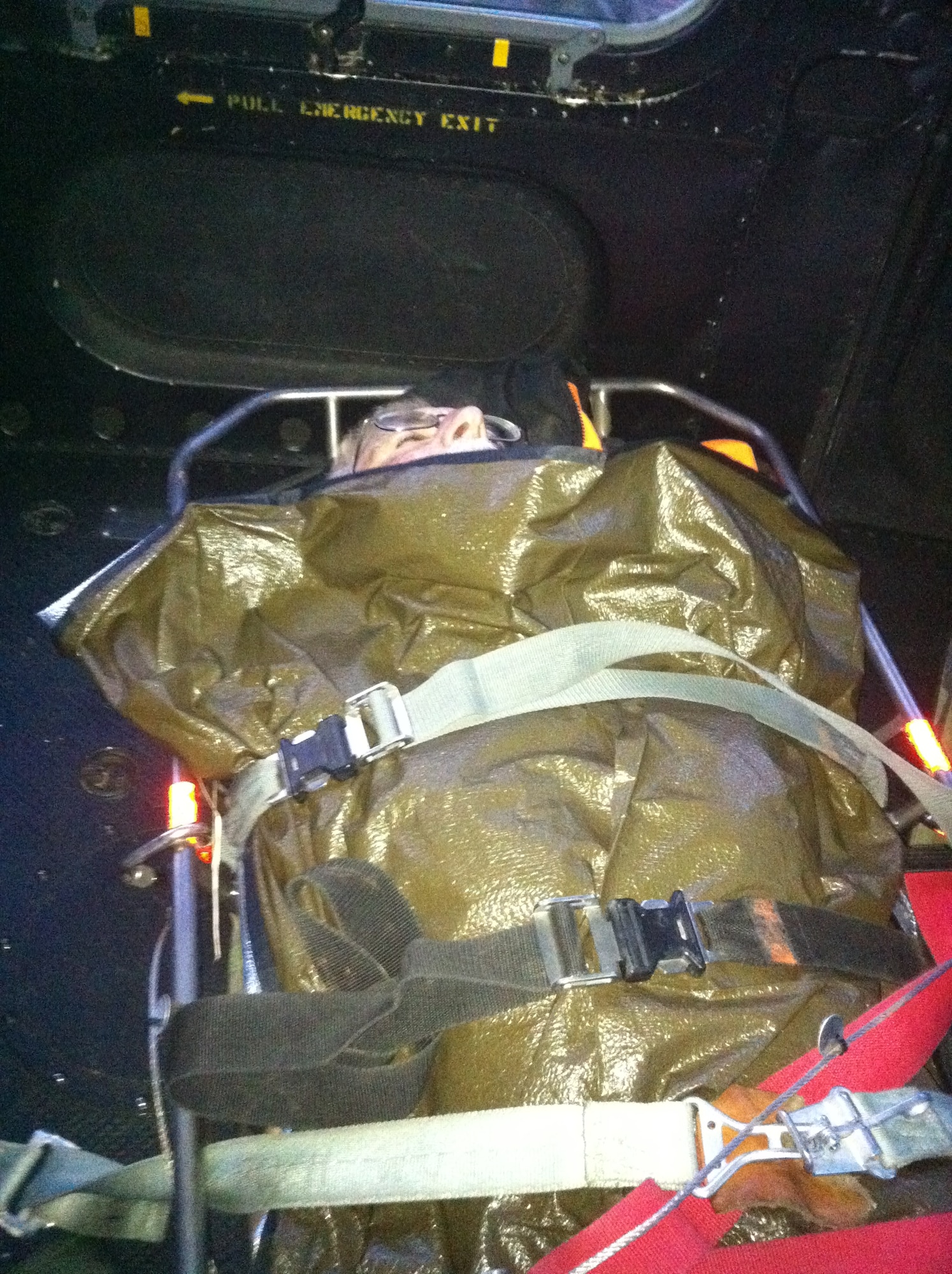 57-year-old Mike Webberley is being flown in a UH-1N helicopter from Fairchild Air Force Base, Wash. to an awaiting Life Flight helicopter following his rescue in the mountains near Lewiston, Idaho Oct. 21. Webberley fell down a steep valley while deer hunting and could not be reached by local authorities, a local ground rescue team or a Life Flight helicopter, so Airmen from Fairchild were called in to rescue him. (Air Force photo/Tech Sgt. Steven Perez)