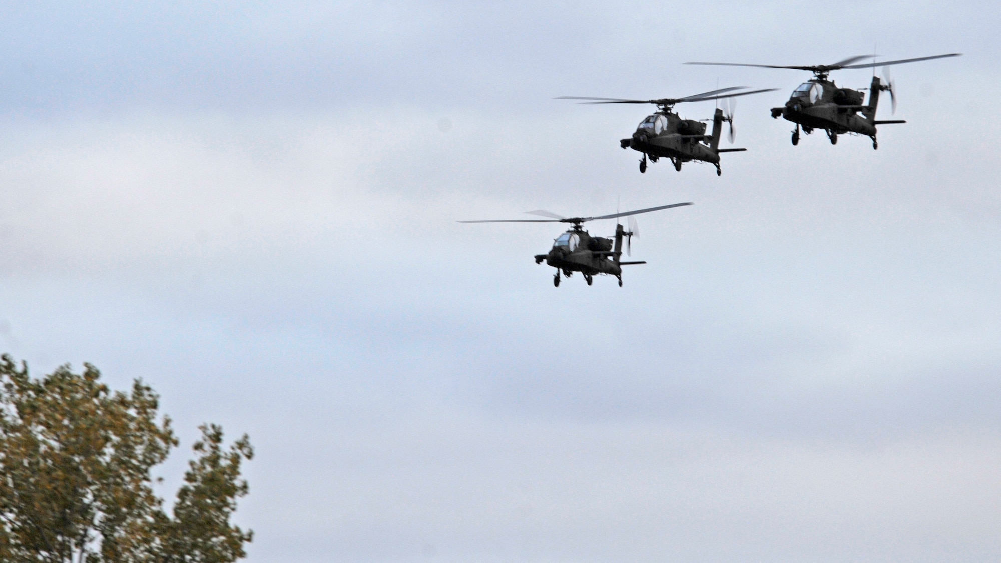 The 1-135th Attack Reconnaissance Battalion received three, new AH-64D Apache Longbow helicopters here Oct. 19. The new helicopters replaced older and outdated ones. The Longbow remanufacture effort incorporates a millimeter wave fire control radar, radar frequency interferometer, fire-and-forget radar-guided HELLFIRE missile and cockpit management. (U.S. Air Force photo/Staff Sgt. Alexandra M. Boutte) (RELEASED)