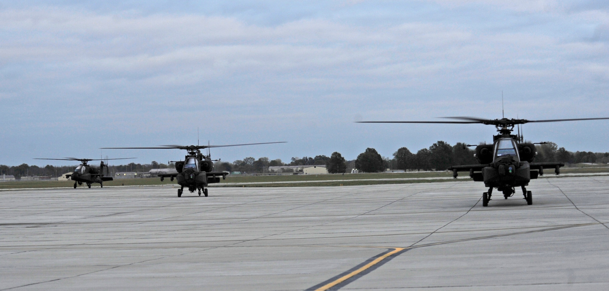 The 1-135th Attack Battalion received three, new AH-64D Apache Longbow helicopters here Oct. 19. The new helicopters replaced older and outdated ones. The Apache's mission conducts distributed operations, precision strikes against re-locatable targets, and provides armed reconnaissance when required in day, night, obscured battlefield and adverse weather conditions. (U.S. Air Force photo by Staff Sgt. Alexandra M. Boutte) (RELEASED)