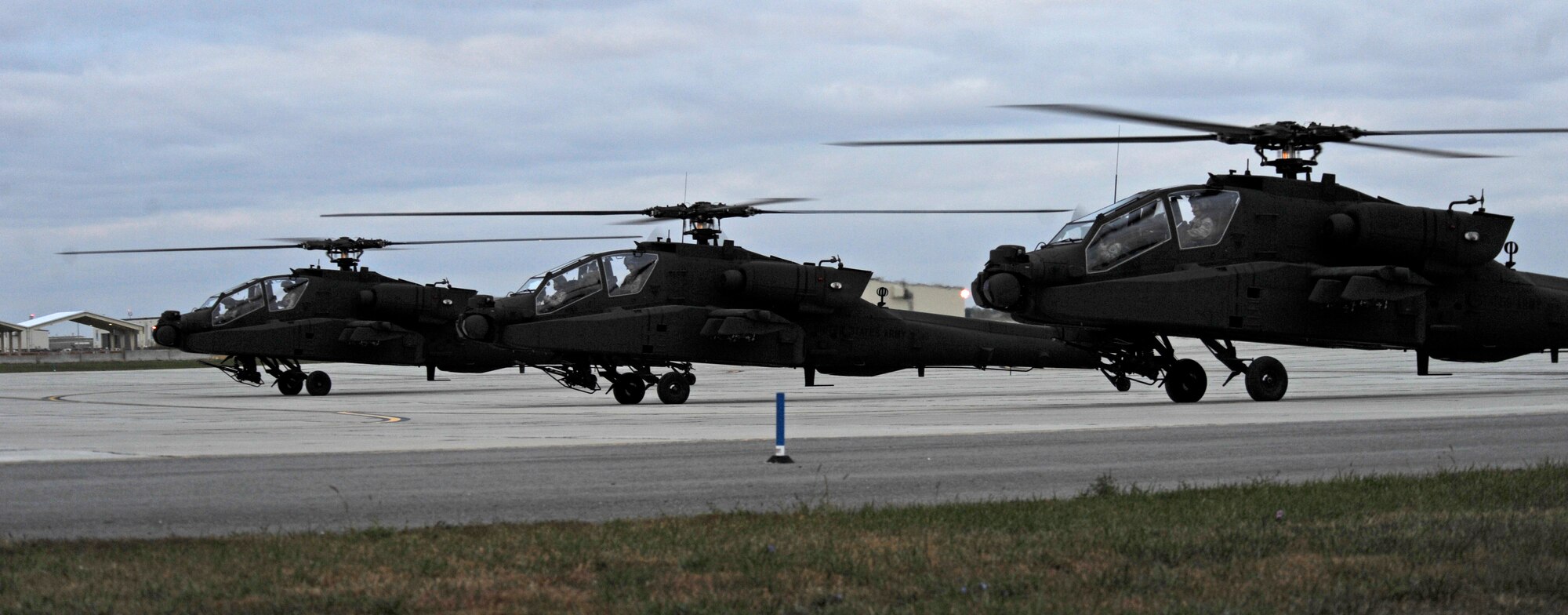 The 1-135th Attack Battalion received three, new AH-64D Apache Longbow helicopters here Oct. 19. The new helicopters replaced older and outdated ones. The combination of fire control radar, radar frequency interferometer and the advanced navigation and avionics suite of the aircraft provide increased situational awareness, lethality and survivability. (U.S. Air Force photo by Staff Sgt. Alexandra M. Boutte) (RELEASED)