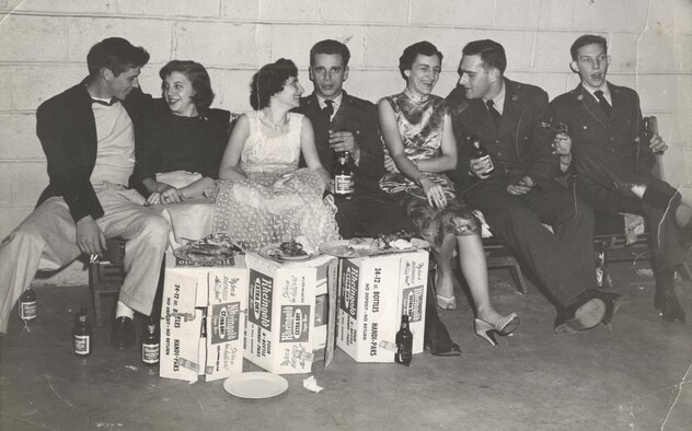 Airman 2nd Class Richard Staley (far right), socializes with fellow Airmen from the 512th Troop Carrier Wing Medium during a wing dining-in, known as a "wing ding," circa 1956. Staley joined the Air Force Reserve unit, then located in New Castle, Del., in 1954, seven years after the Air Force became a separate service. (Courtesy photo)