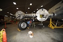 DAYTON, Ohio (10/2011) -- Restoration specialists at the National Museum of the U.S. Air Force extend the landing gear on the Boeing B-17F &quot;Memphis Belle.&quot; (U.S. Air Force photo by Ben Strasser)