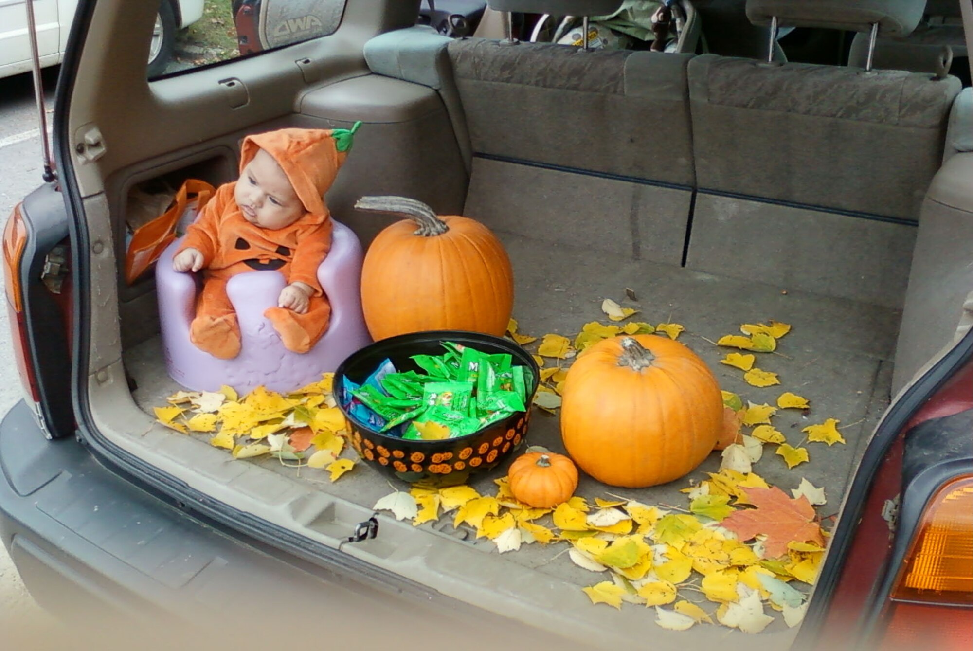 HANSCOM AIR FORCE BASE, Mass. – Samuel Gernert waits for trunk-or-treaters to stop by for candy during the Trunk or Treat and Fall Festival event at the chapel Oct. 23. (Courtesy photo)