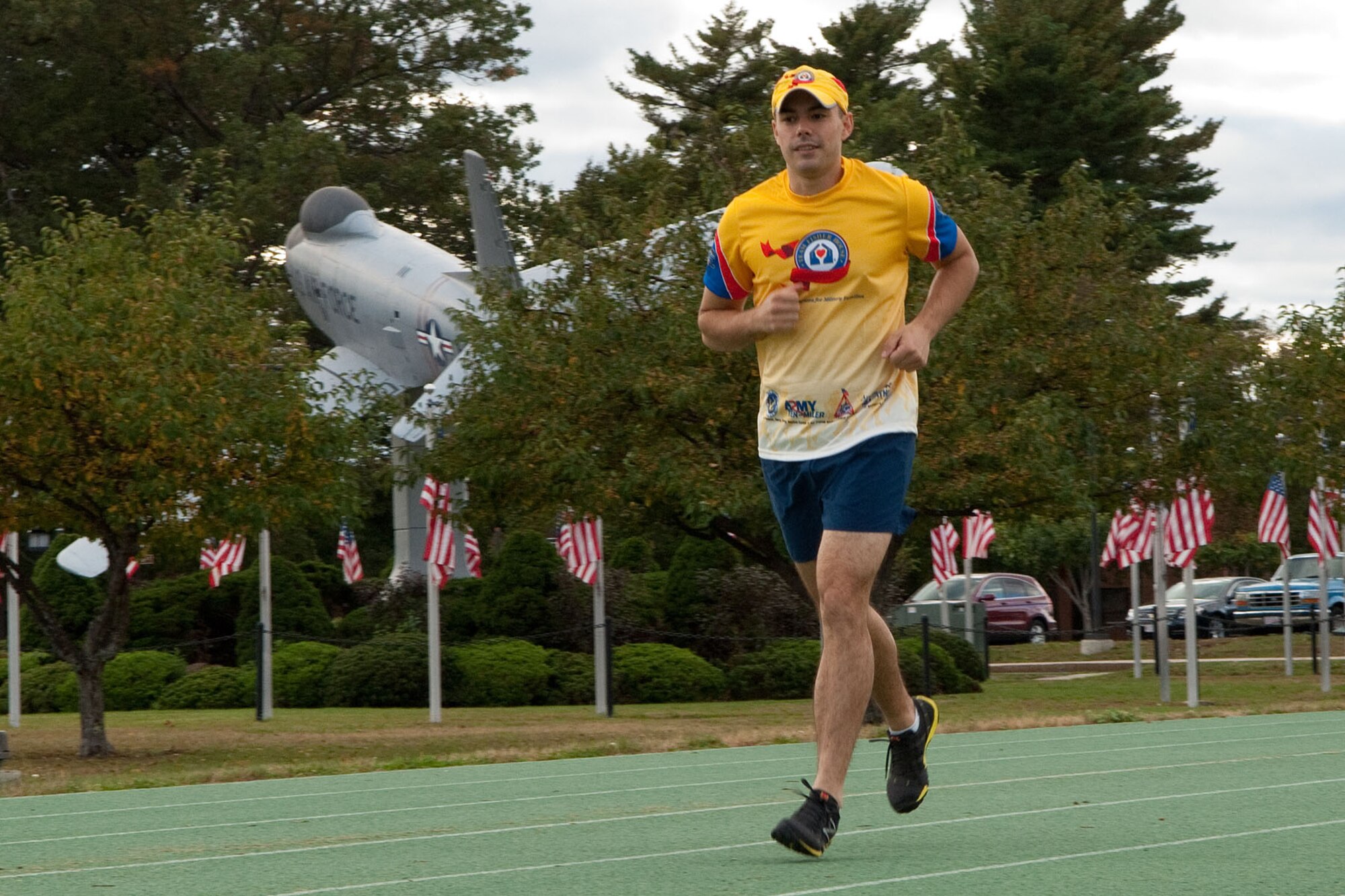 HANSCOM AIR FORCE BASE, Mass. – Senior Airman Dennis Cooke, from the 66th Medical Squadron Mental Health Flight, trains for the Marine Corps Marathon at the base track Oct. 25. Airman Cooke is running the marathon not only to stay fit but to also honor all of his fellow service men and women who are not able to run. (U.S. Air Force photo by Linda LaBonte Britt)
