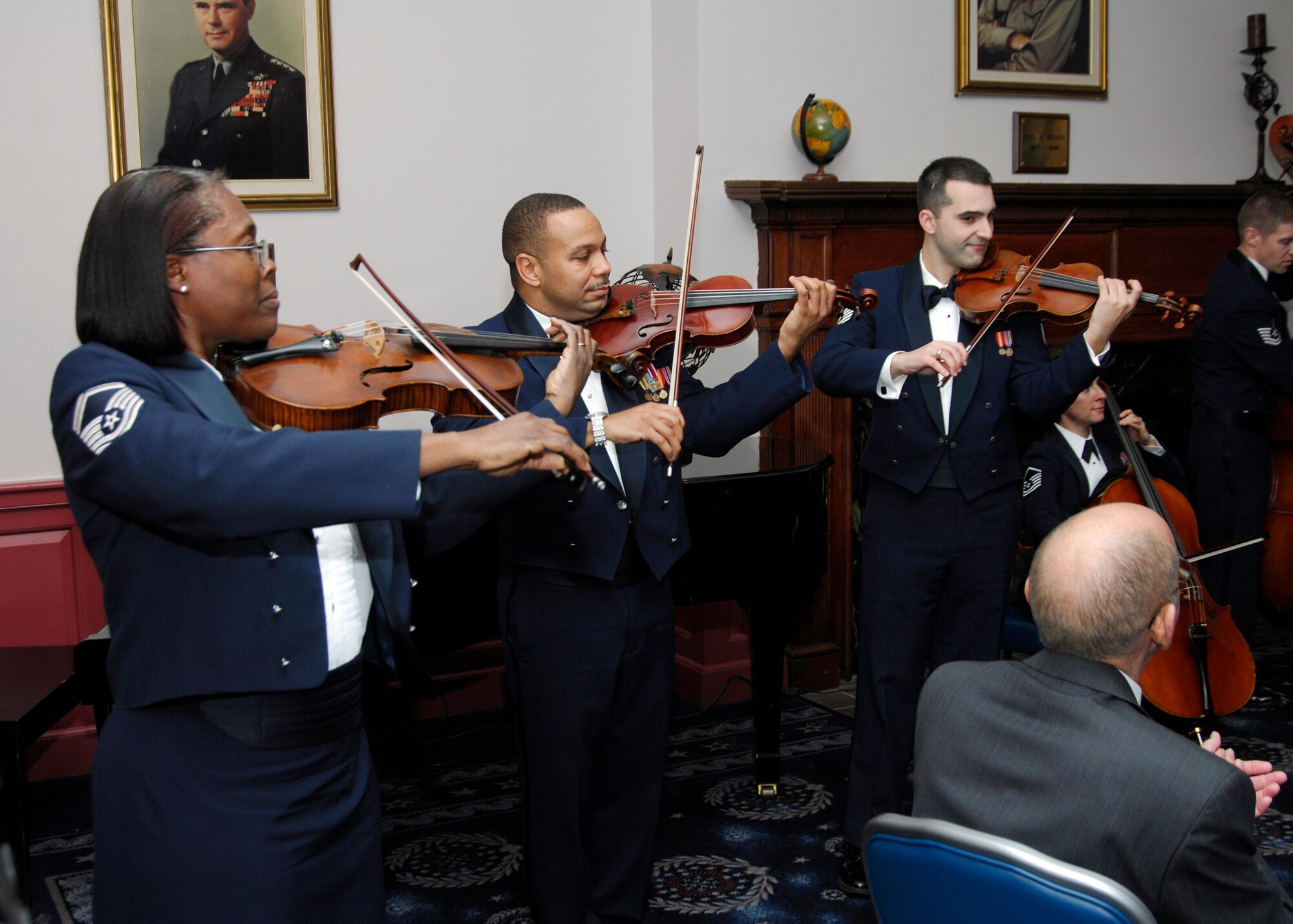 Members of the Air Force Strings perform selections from its “Strolling Strings” repertoire