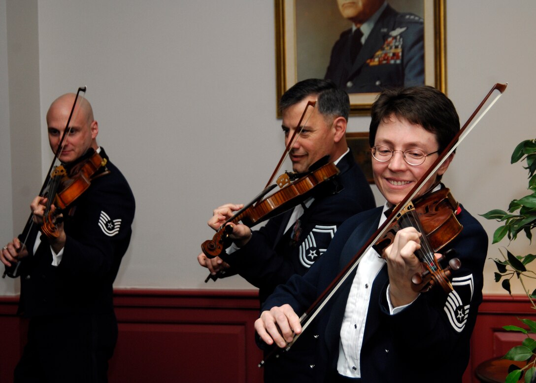 Members of the Air Force Strings perform selections from its “Strolling Strings” repertoire