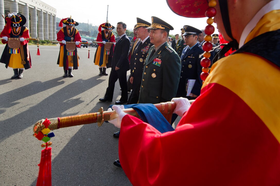 From left, South Korean Defense Minister Kim Kwan-Jin; U.S. Defense Secretary Leon E. Panetta; U.S. Army Gen. Martin E. Dempsey, chairman of the Joint Chiefs of Staff;  and Gen. Jung Seung-jo, chairman of the South Korean Joint Chiefs of Staff, prepare to enter the Ministry of Defense in Seoul, South Korea, Oct. 27, 2011.
