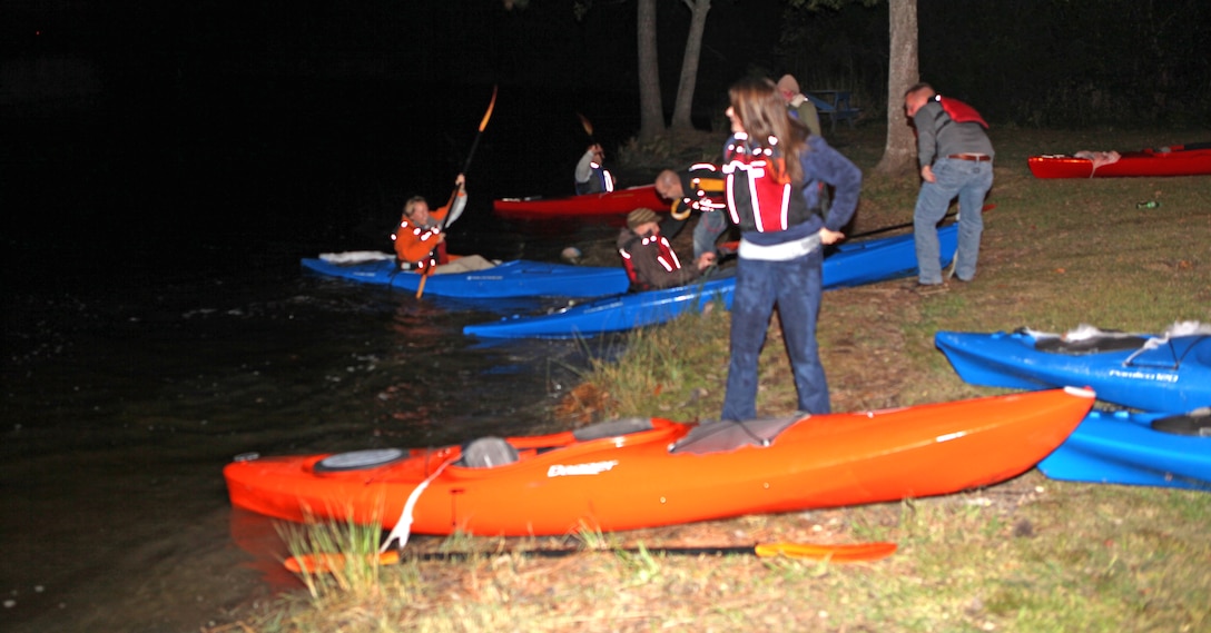 Participants pull in the Kayaks after Haunted Kayaking event on Scales Creek aboard Camp Johnson, Oct. 28. Marine Corps Community Services hope Haunted Kayaking can become an annual Halloween event and its creators plan to change the stories from year to year to keep them interesting.