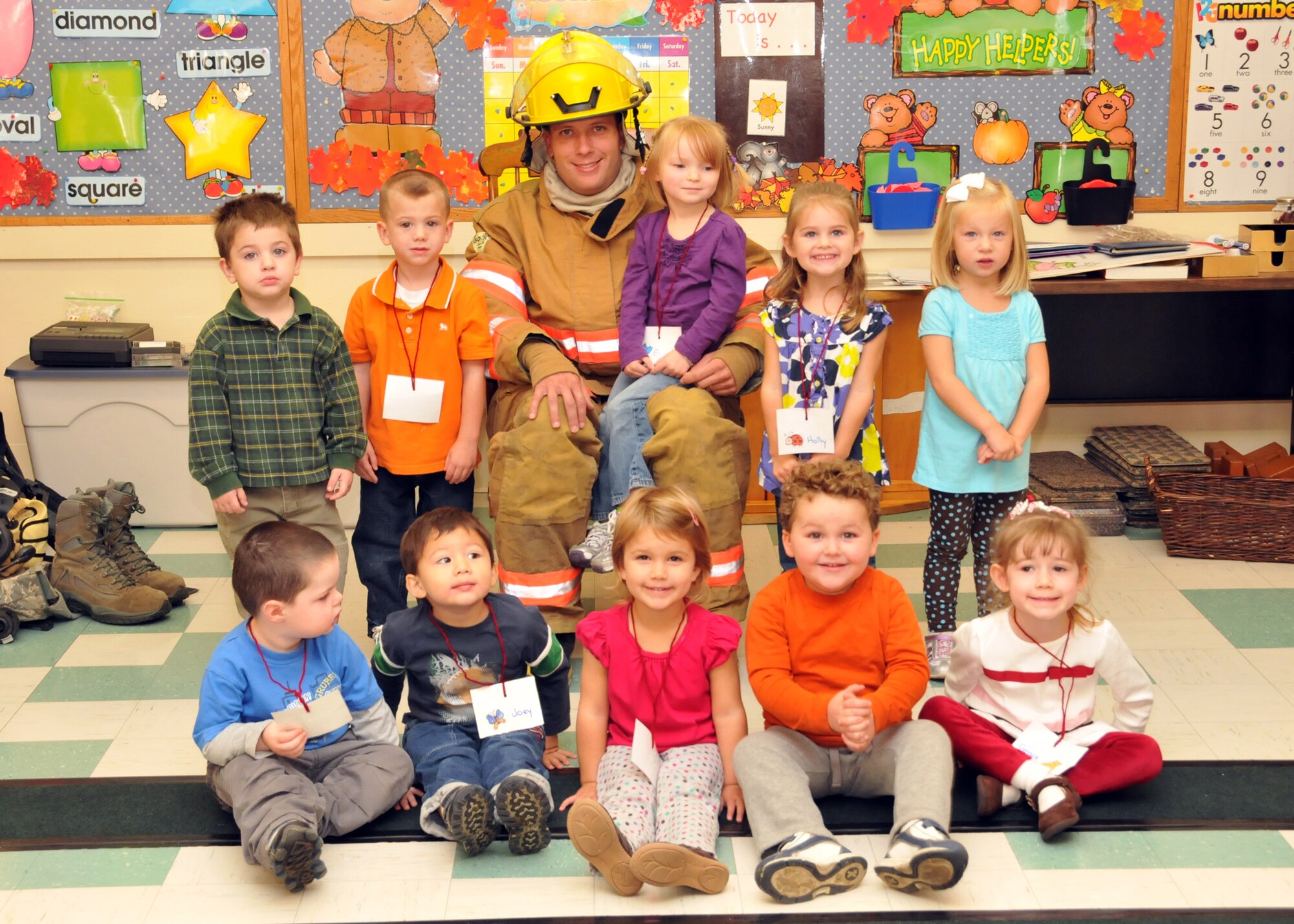 As part of Fire Safety Week in October, firefighters from the Niagara Falls Air Reserve Station fire department visit the pre-kindergarten class at Sister of Charity School, Buffalo, NY.  The firefighters talked to the children about fire safety and what they should do in the event of a fire.  (U.S. Air Force photo by Staff Sgt. Joseph McKee)