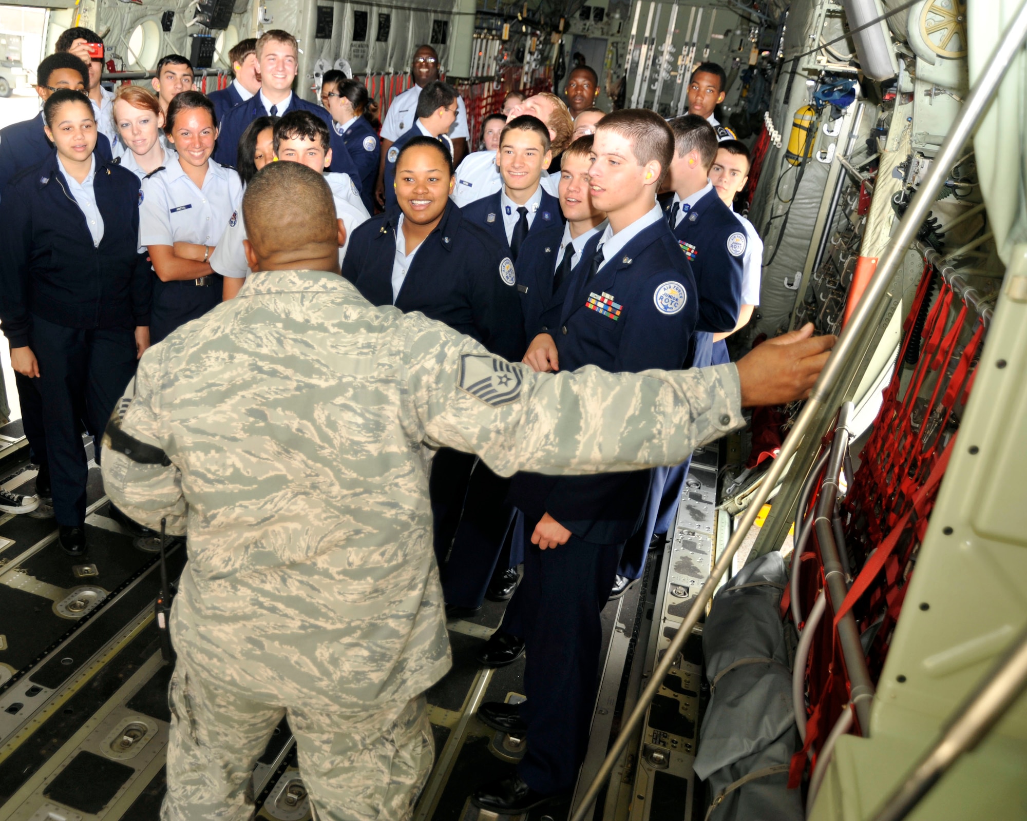 Master Sgt. Byron Bryant, 403rd Maintenance Squadron, shows Junior Reserve Officer Training Corps cadets the interior of a C-130J aircraft. The JROTC cadets are from Bay High School, Bay St. Louis, Miss. and were hosted by Bryant and other members of MXS while at Keesler Air Force Base for the 81st Training Wing drill-down. For some of the cadets, this was their first time ever stepping foot onto a military aircraft. (U.S. Air Force photo by Maj. Heather Newcomb)