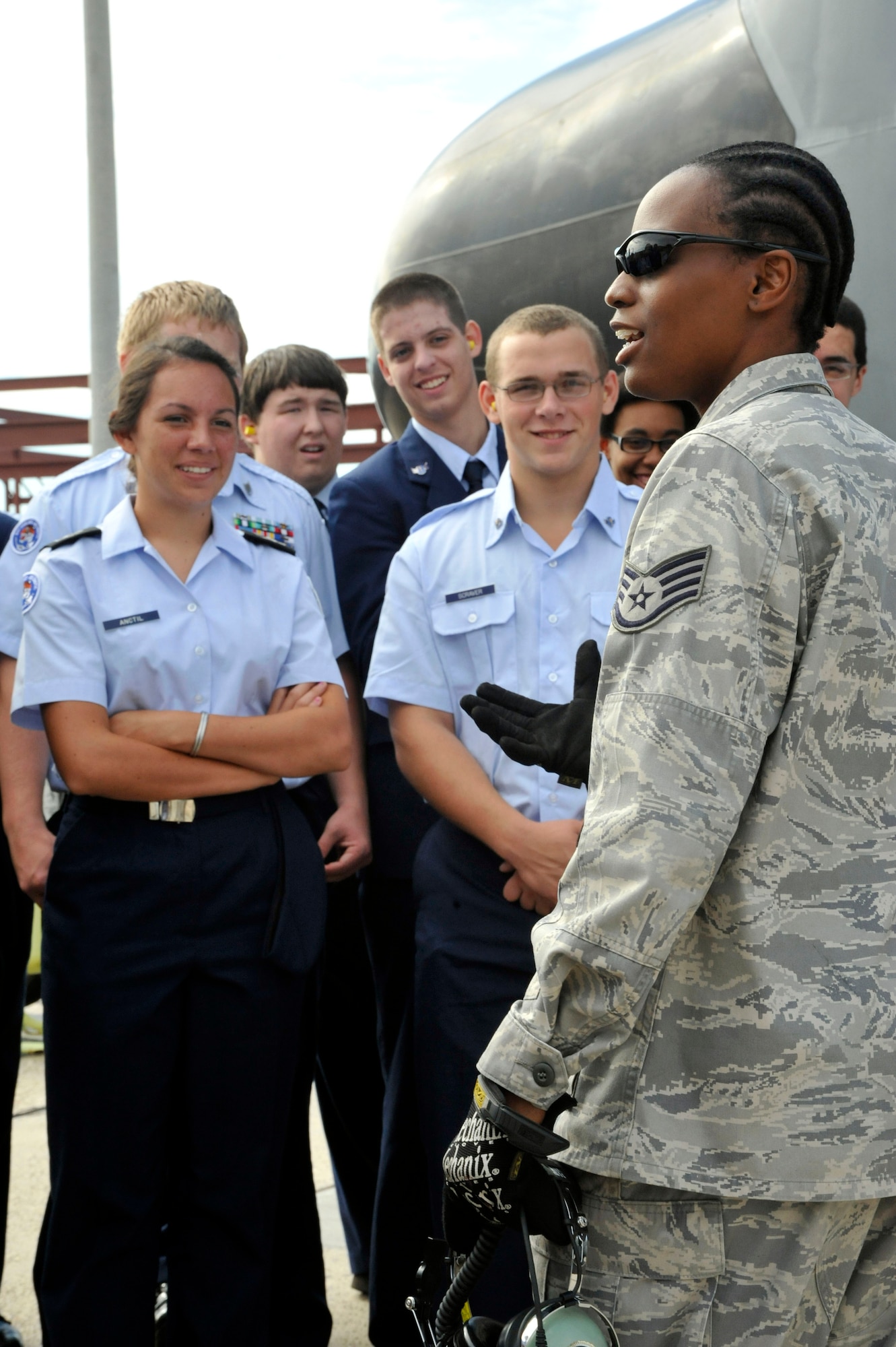 Staff Sgt. Karen Moore, 403rd Maintenance Squadron, speaks with Junior Reserve Officer Training Corps cadets from Bay High School, Bay Saint Louis, MIss. Oct. 28. The electrical environmentalist technician stressed the importance of doing the right thing in school and the benefits of being in the U.S. Air Force Reserve. The JROTC cadets visited the MXS and toured a C-130J aircraft while at Keesler Air Force Base. (U.S. Air Force photo by Maj. Heather Newcomb)