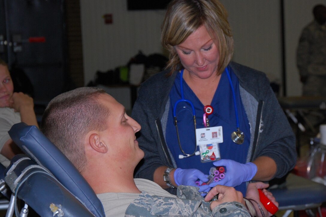 A Sheppard Airman gives blood at the Sheppard Air Force Base October Blood Drive, Oct. 27, 2011. During the three-day drive, 547 Sheppard donors contributed 473 units of blood to the Texas Blood Institute blood bank. (U.S. Air Force photo/Capt. Brittany Martin)
