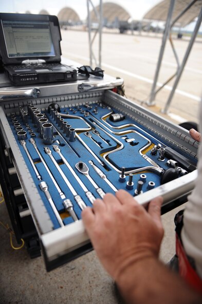 U.S. Air Force Staff Sgt. Michael Mindziak, 476th Maintenance Squadron crew chief, checks the inventory of his tools prior to preparing a jet for takeoff at Moody Air Force Base, Ga., Oct. 27, 2011. Inventory is completed prior to takeoff to ensure there are no tools left on or near the aircraft. If a tool is unaccounted for, a Foreign Object Debris walk is performed by the shop to locate the item.  (U.S. Air Force photo by Senior Airman Ciara Wymbs/Released) 