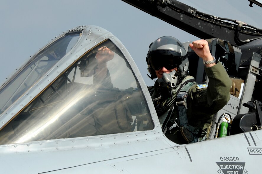 U.S. Air Force Lt. Col. Mitch Hanson, 47th Fighter Squadron director of operations, returns from a sortie at Barksdale Air Force Base, La., Oct. 26, 2011. Hanson flies the A-10 Thunderbolt II aircraft and this mission marked his last flight with the squadron. (U.S. Air Force photo by Master Sgt. Greg Steele/Released)