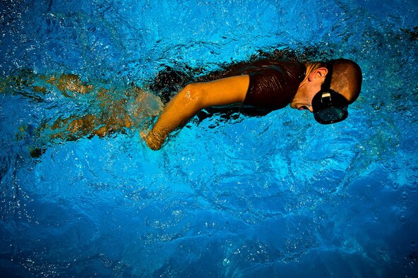 Air Force Pararescue Jumper trainees participate in the water confidence introductory course Aug. 16 at Lackland. During the course, trainees learn mask and snorkel recovery, buddy breathing and other techniques. PJ introductory training includes physiological training, the obstacle course, marches, dive physics, dive tables, metric manipulations, medical terminology, cardiopulmonary resuscitation, weapons qualifications, PJ history and leadership reaction.  (U.S. Air Force photo/Staff Sgt. Jonathan Snyder)