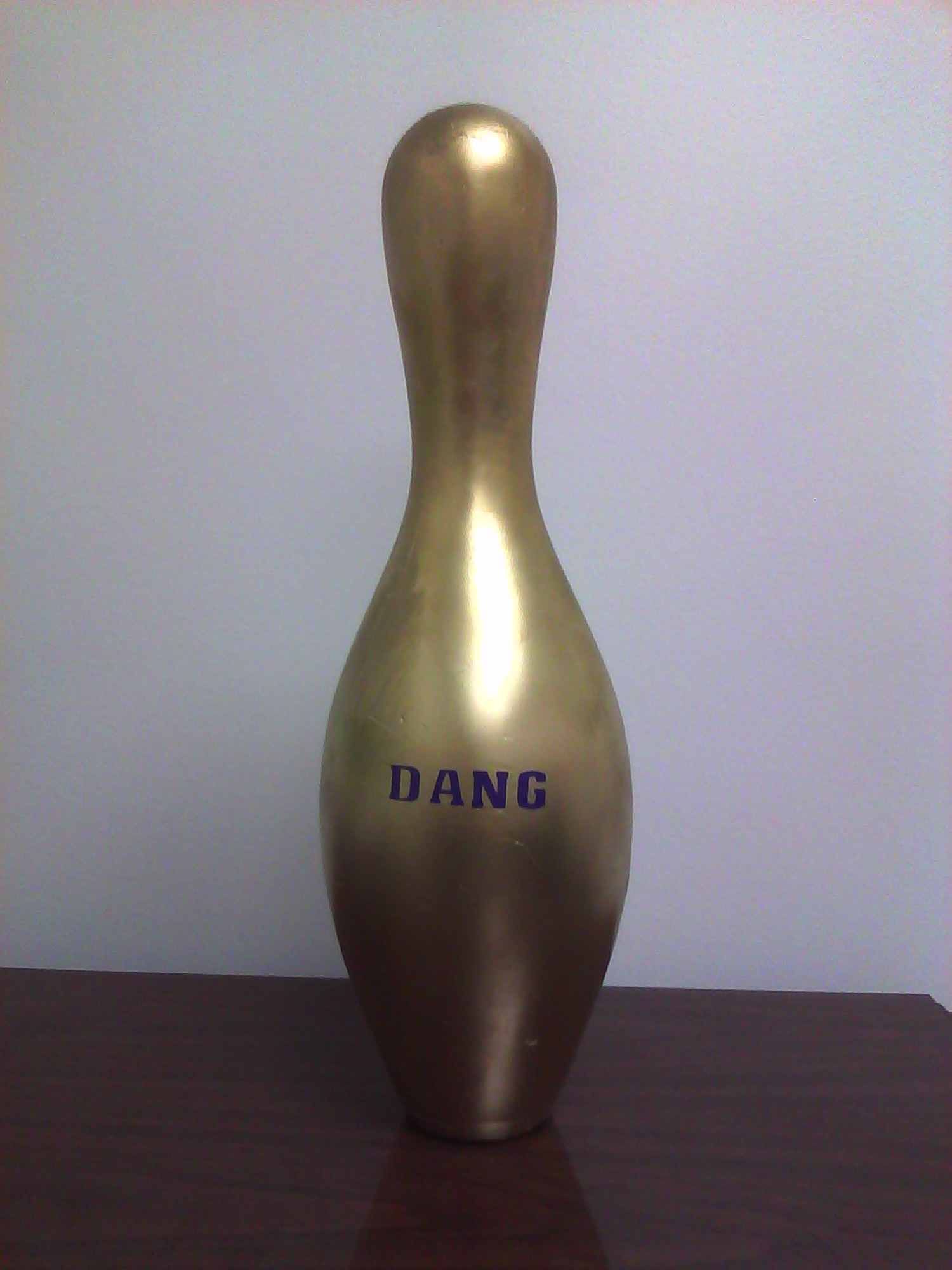 The DANG Golden Bowling Pin, representing the Junior Enlisted Council-sponsored annual Delaware Air National Guard Bowling Tournament, a fundraiser that supports morale-building activities for wing Airmen and charitable causes. (U.S. Air Force photo/Tech. Sgt. Brandie Yankush)