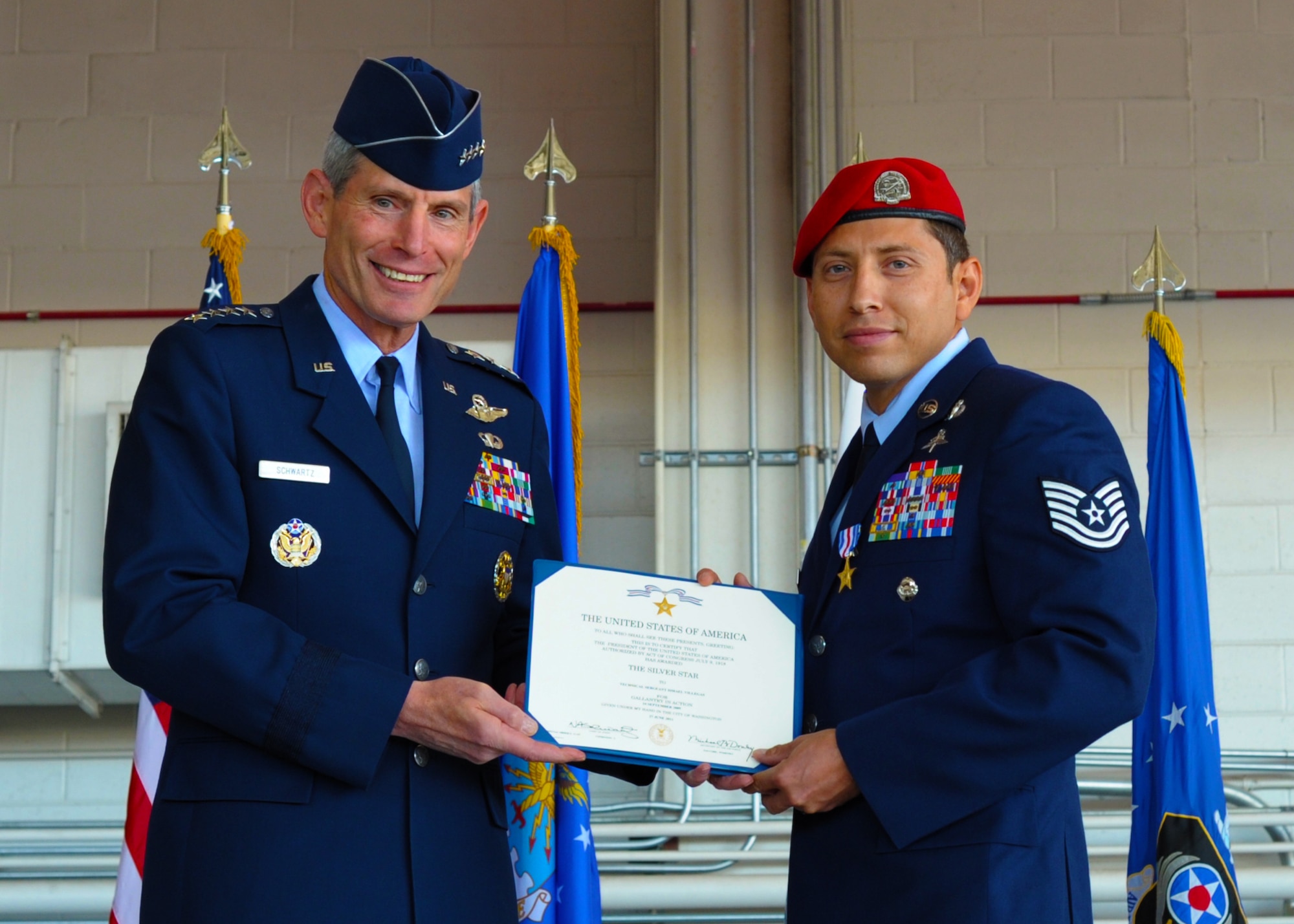 Air Force Chief of Staff Gen. Norton Schwartz presents the Silver Star to Tech. Sgt. Ismael Villegas, during a ceremony at Hurlburt Field, Fla., Oct. 27, 2011. Villegas was awarded the Silver Star, the third highest military decoration, for his gallantry in action against enemy forces while deployed in support of Operation Enduring Freedom. (U.S. Air Force photo/Staff Sgt. Sharida Jackson)