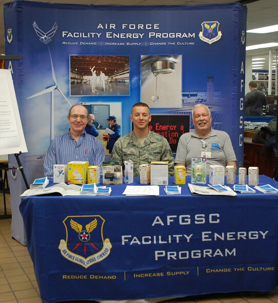 Members of Malmstrom's Energy Management Team greeted visitors to the base exchange Oct. 12. Left to right are George Georgalis, 341st Civil Engineer Squadron resource efficiency manager; Staff Sgt. Jared Bratsberg, 341st Logistics Readiness Squadron fossil fuel reduction moniter; and Kent Seaton, 341st CES Base Energy Manager. (U.S. Air Force photo/Valerie Mullett)